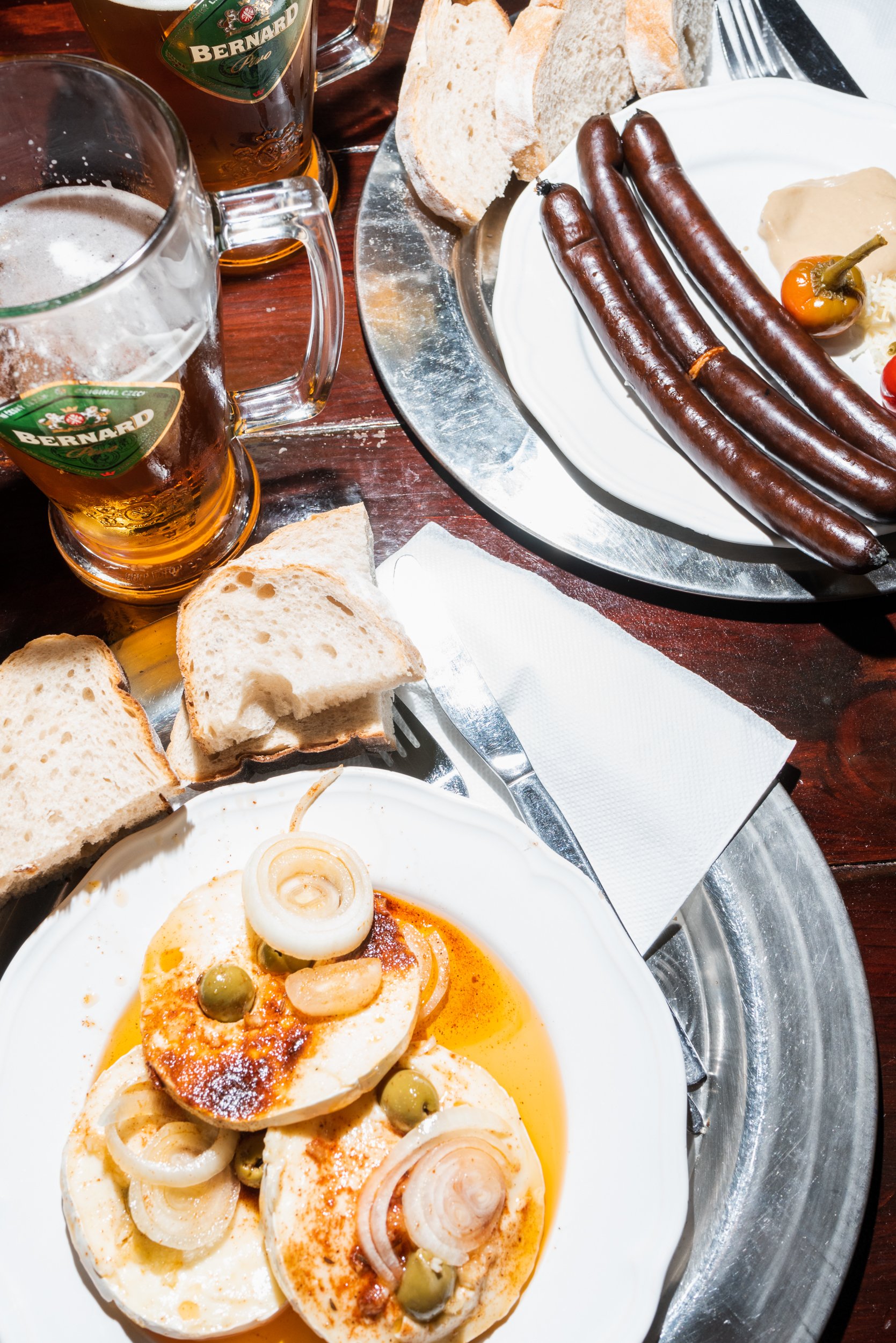 Traditional Slovak food on plates with beer