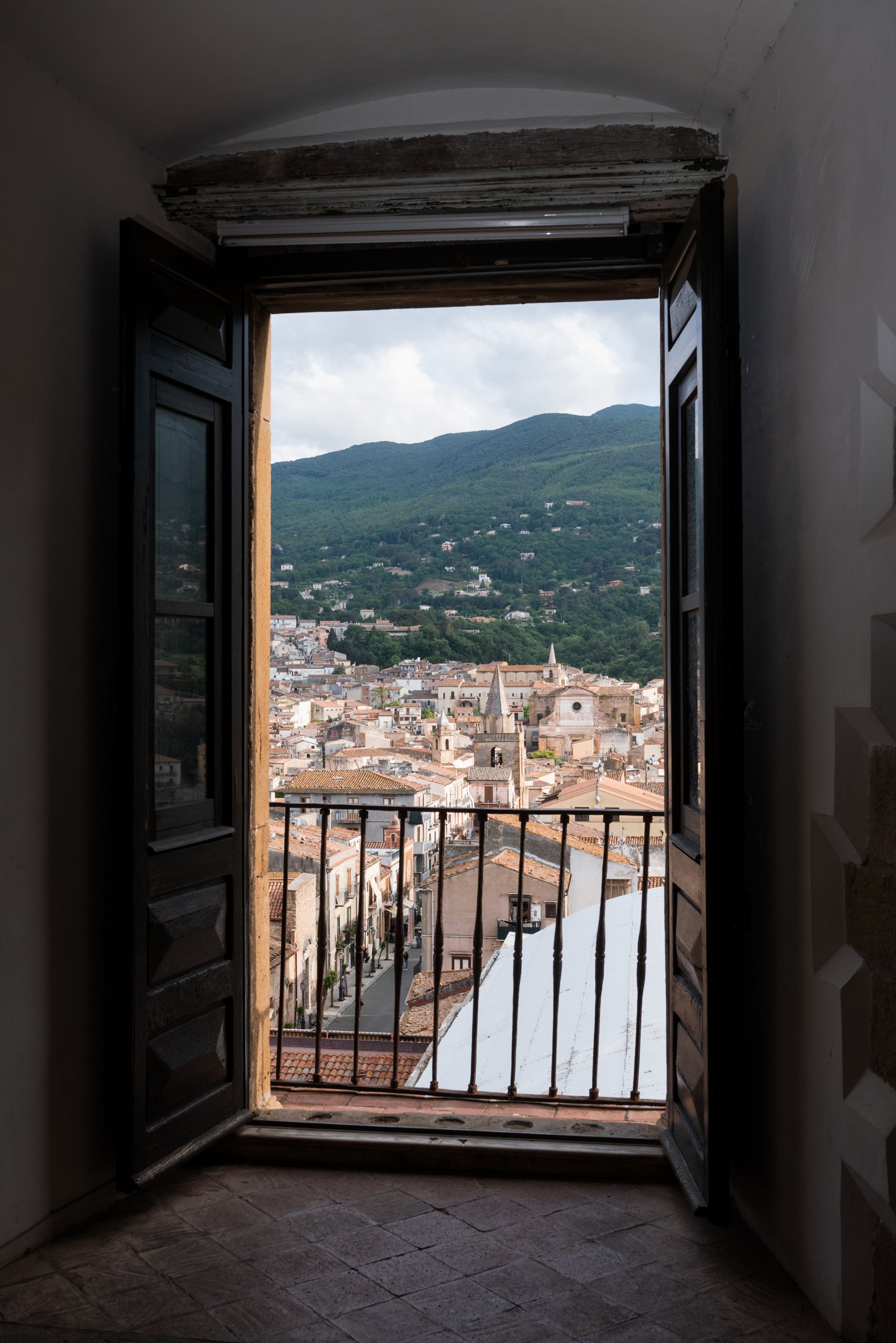 View of Castelbuono through door