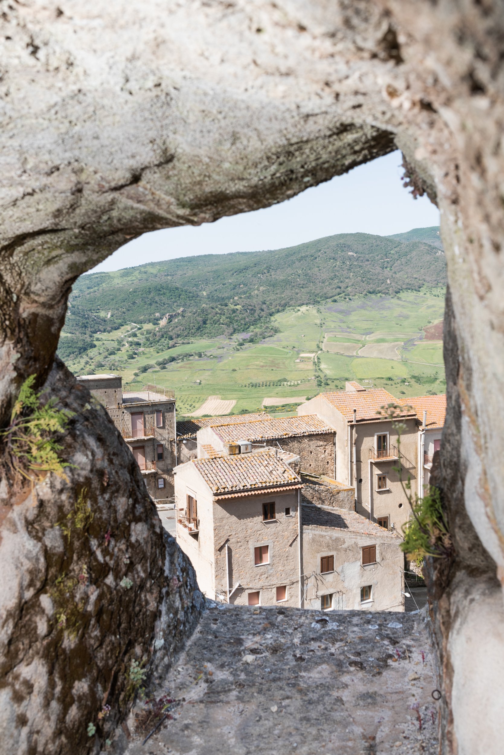 View of Sperlinga through hole in wall