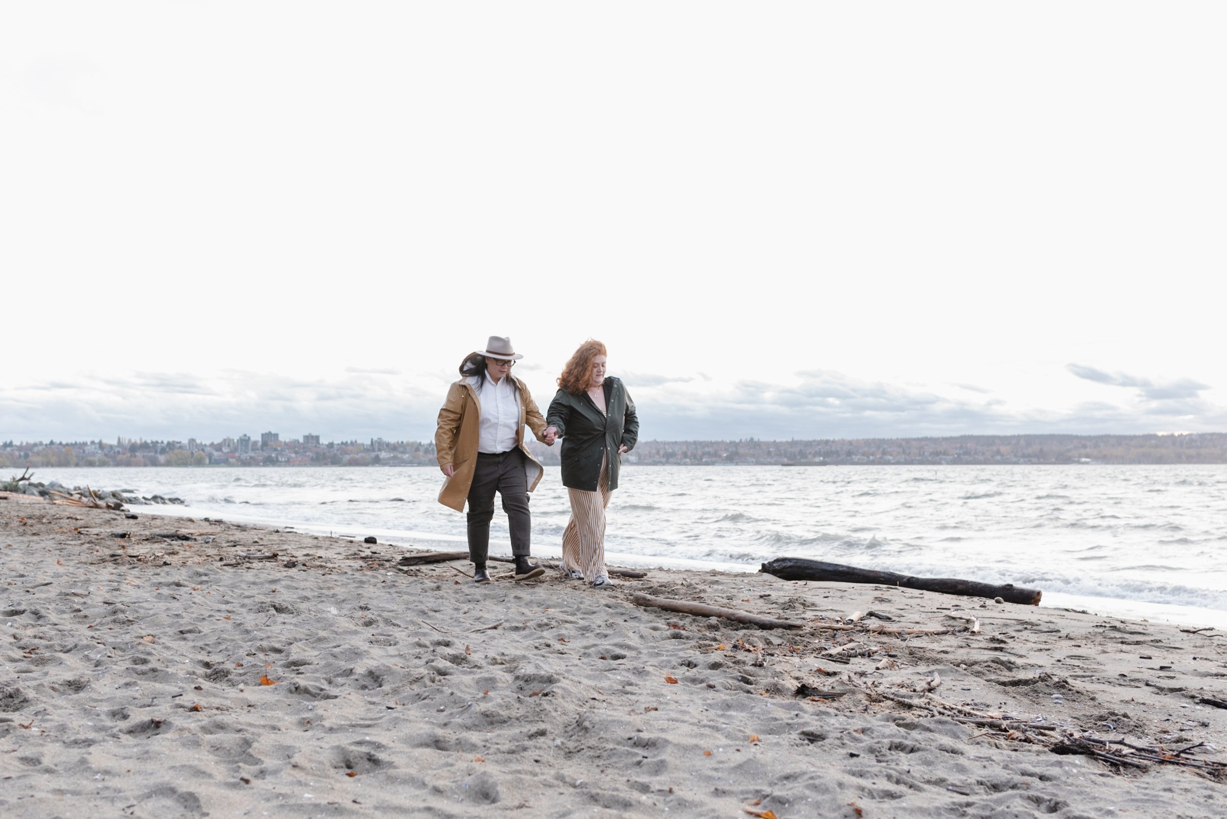 Couple walks down Stanley Park's Second Beach