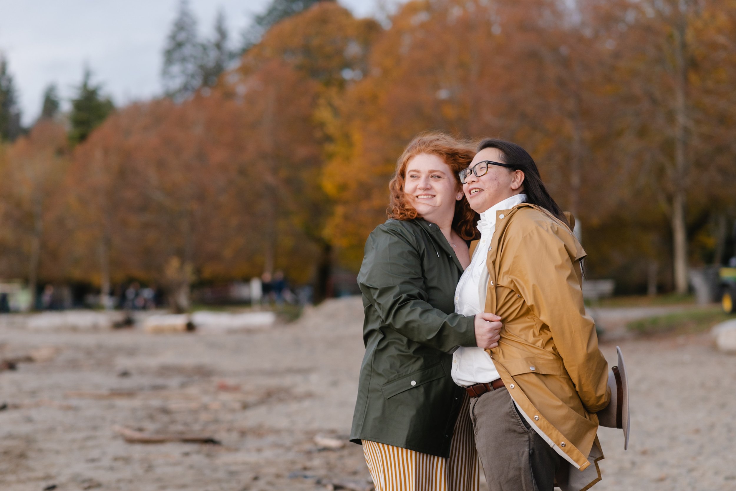 Couple embracing at Stanley Park's Second Beach
