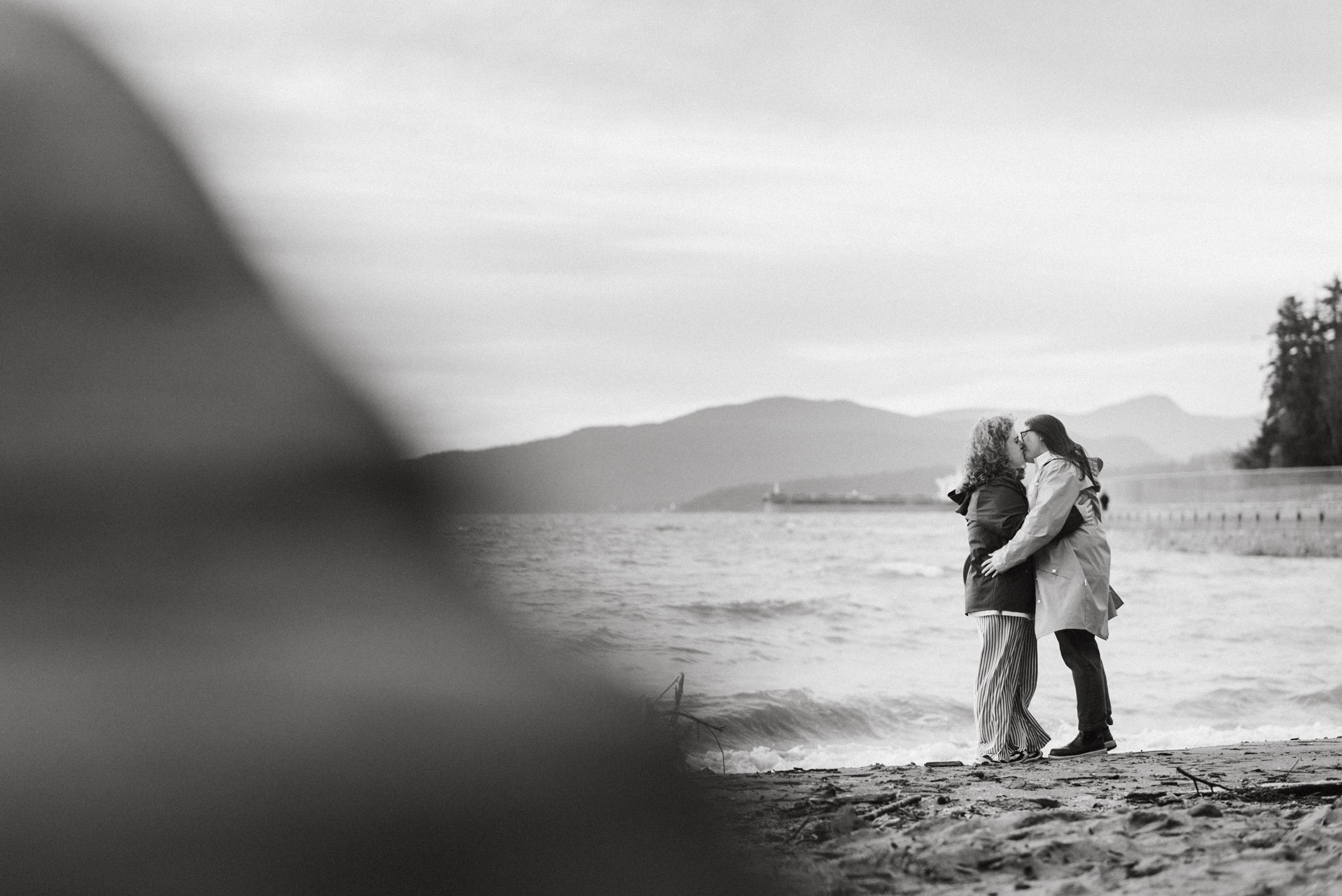 Couple embracing at Stanley Park's Second Beach