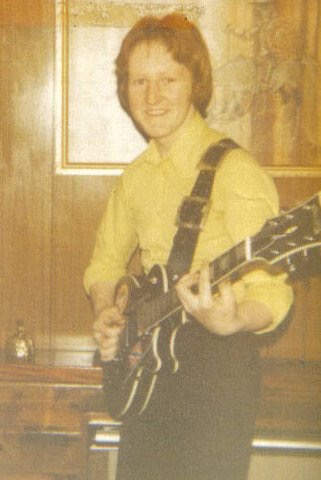 Taff with guitar about 1976