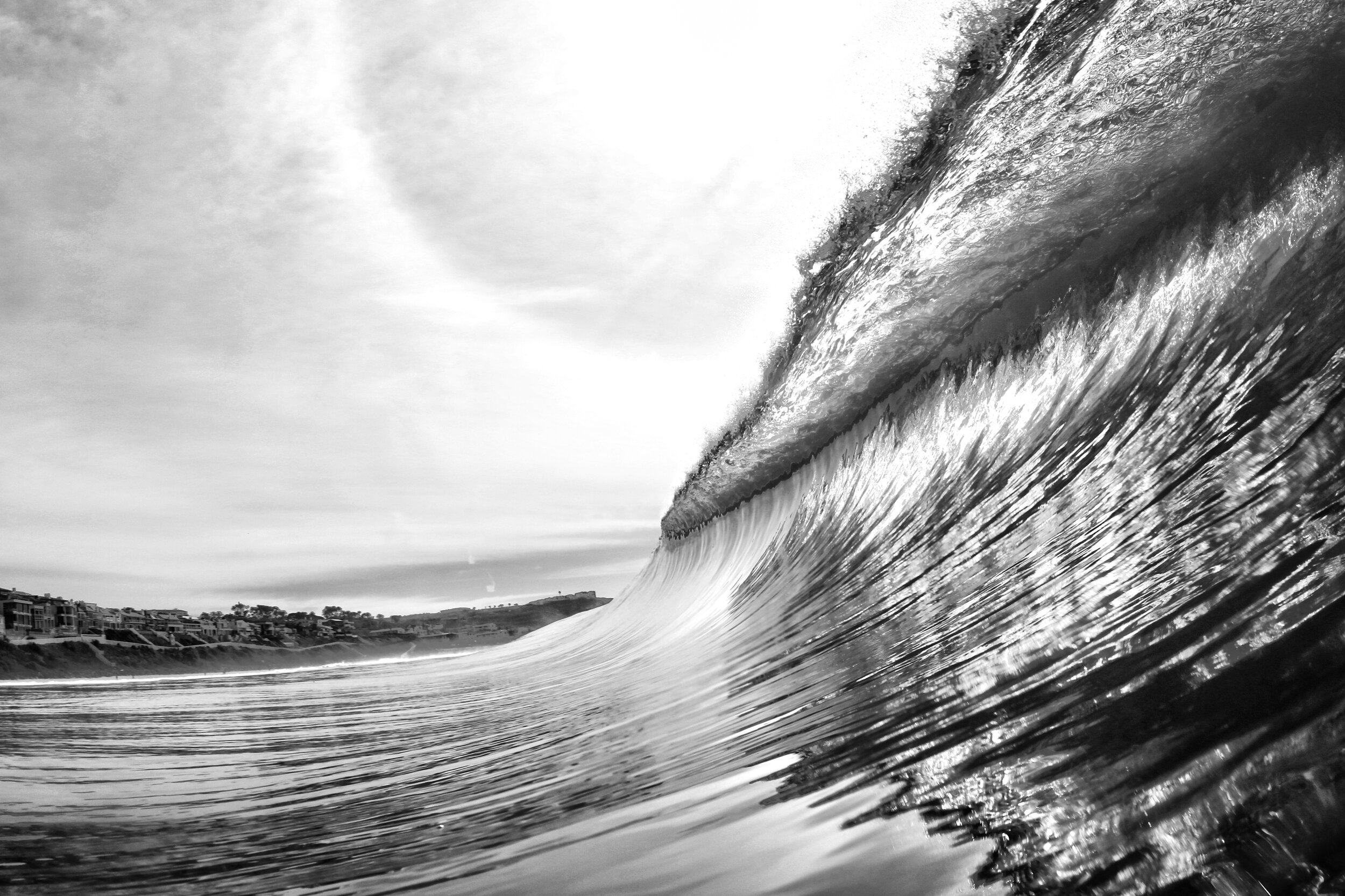 B&W photo of a wave about to break