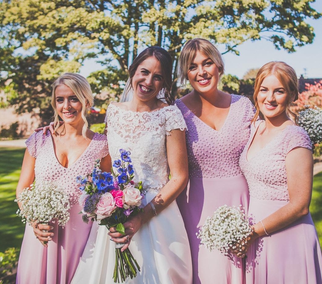Jennifer and her gorgeous bridesmaids in Pink Polka