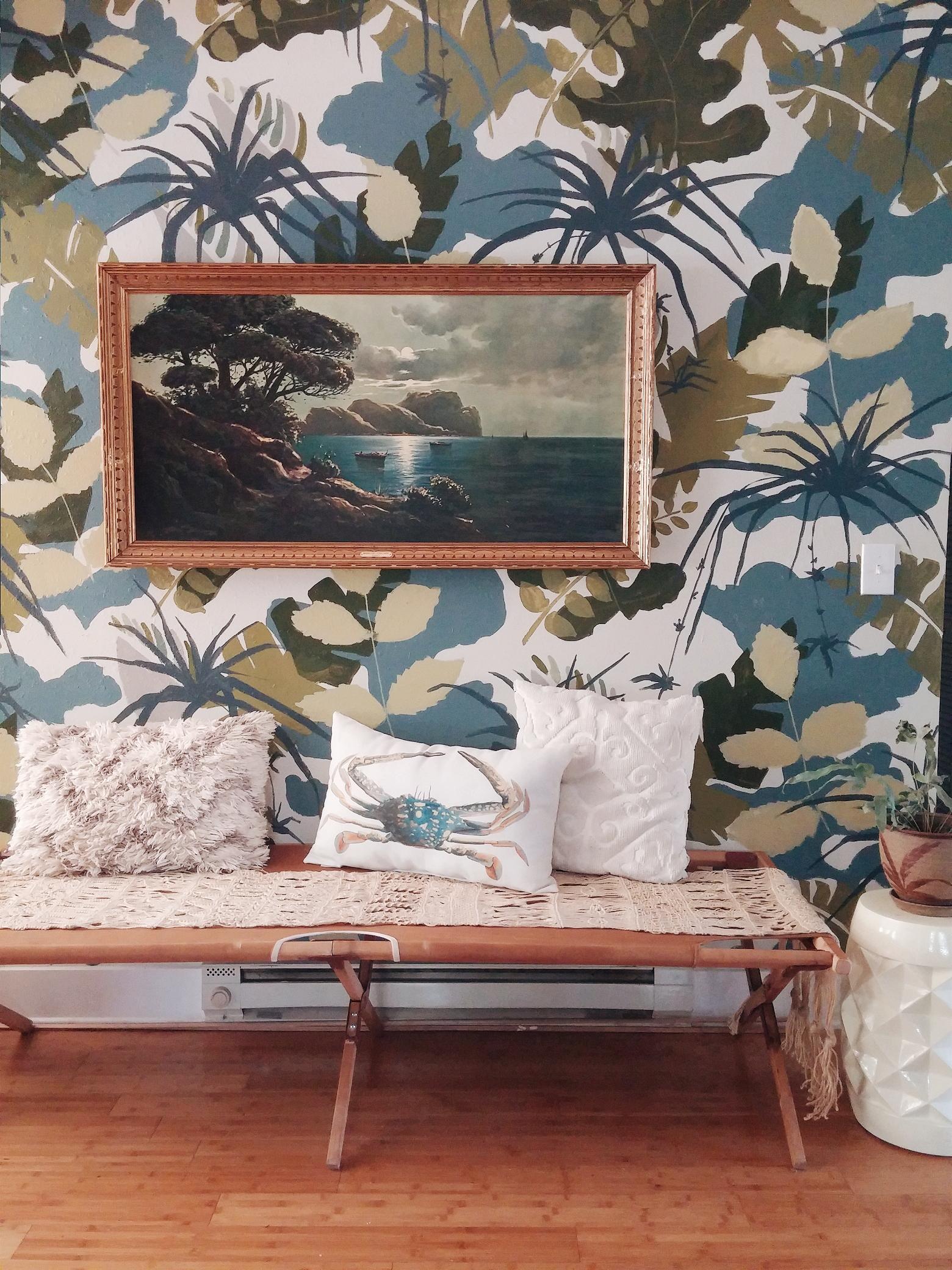 Before the pink shapes and yarn leaves this wall was a jungle mural. That’s another perk of paint. Change your mind? Paint over it!