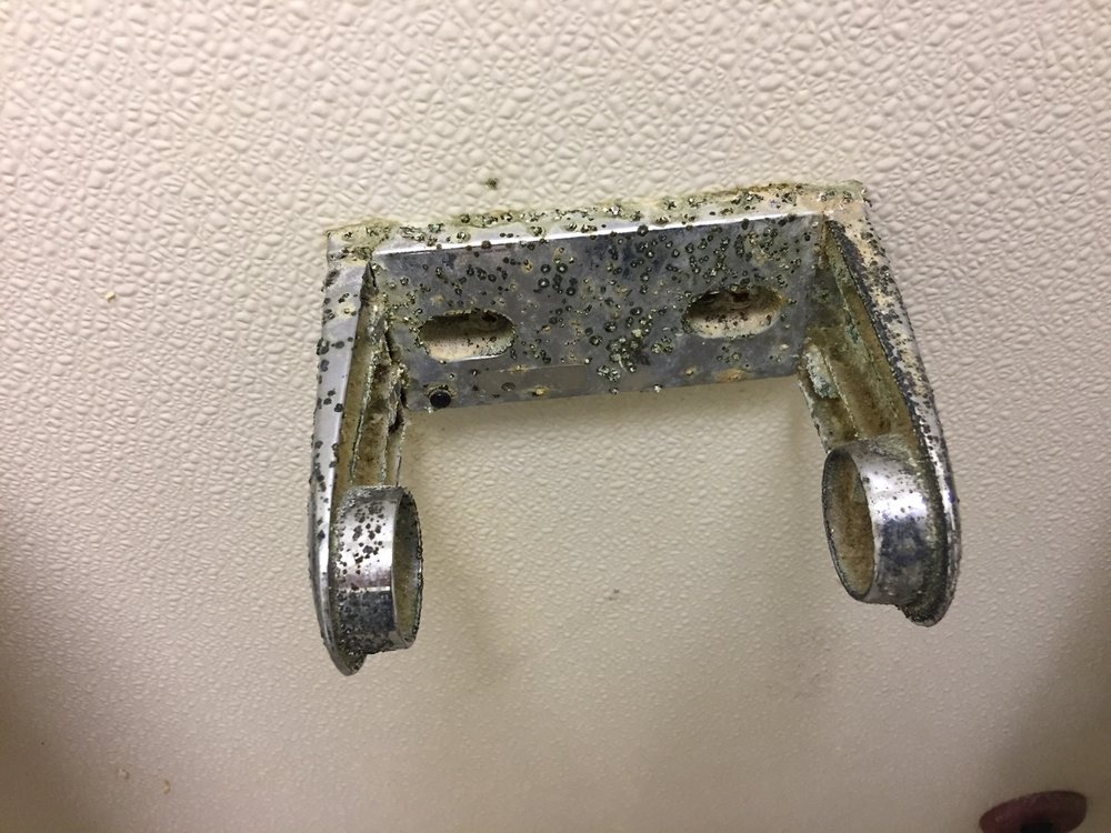 Toilet Paper Holder Corroding Due to Chinese Drywall Found During Home Inspection Houston Texas