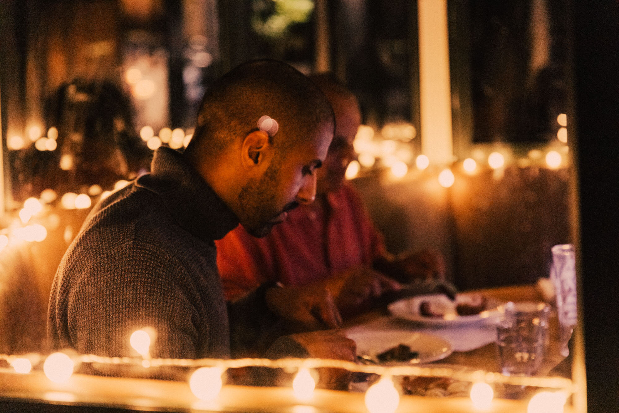 Customer enjoying dinner in an Oak Pod at Banyers House pub and restaurant.jpg