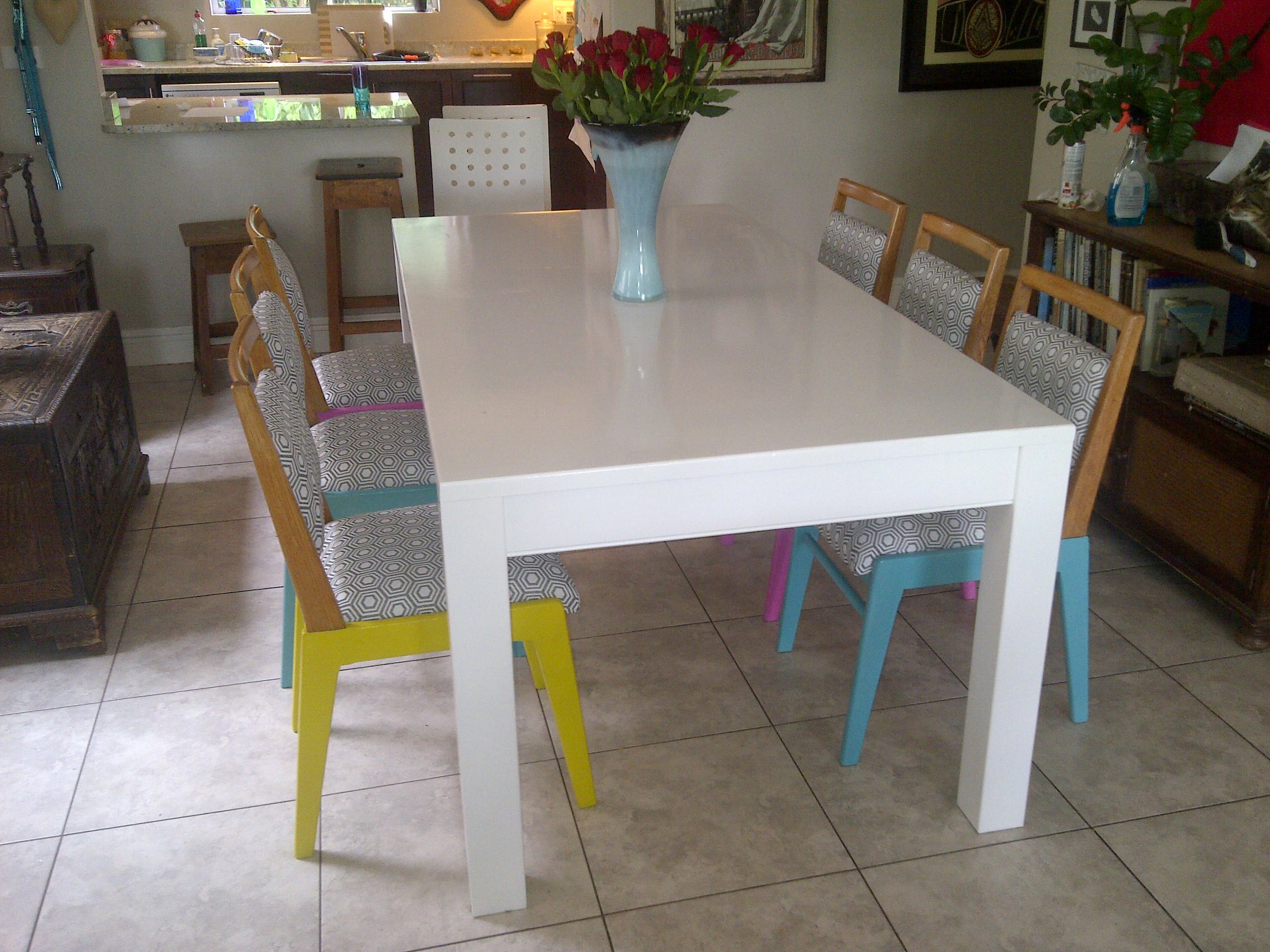 Second hand shop chairs find a new lease on life with some snazzy paint colours and Hertex fabric.
