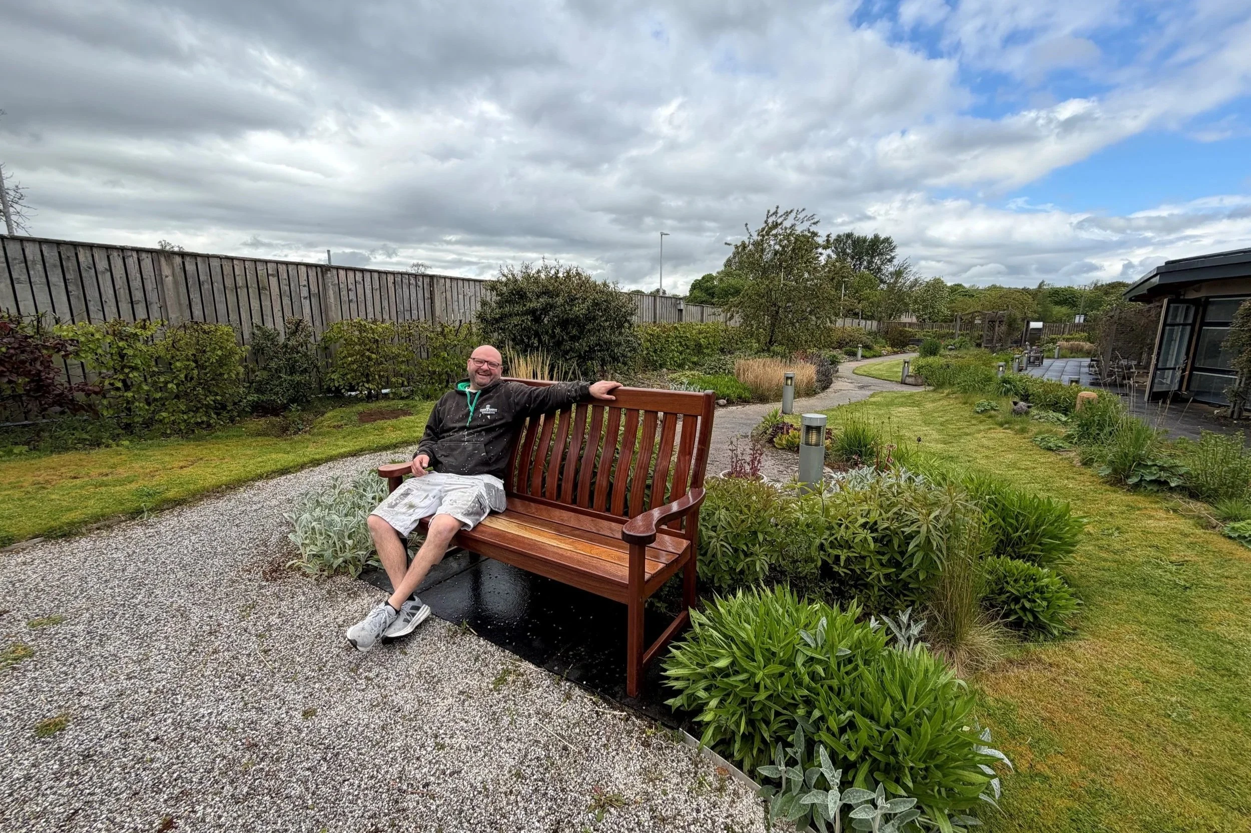 Derek Easson Refurbs Benches for The Margaret Kerr Unit Garden