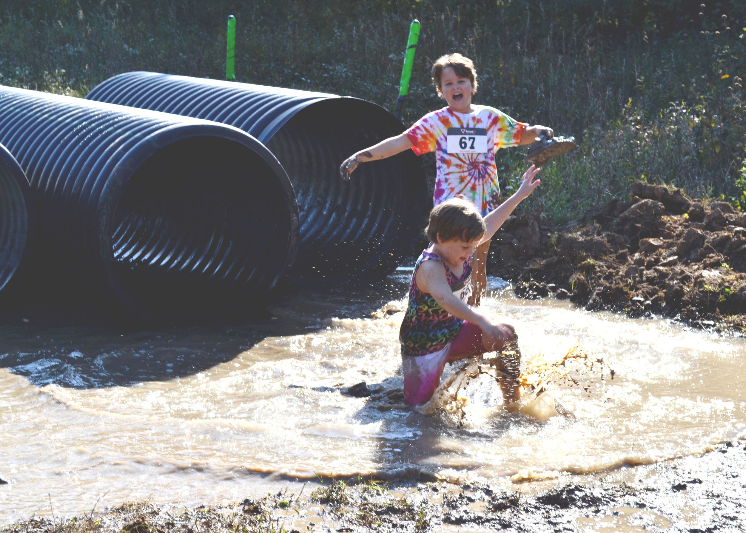 Two-Kids-Splashing-Tube-Obstacle.jpg