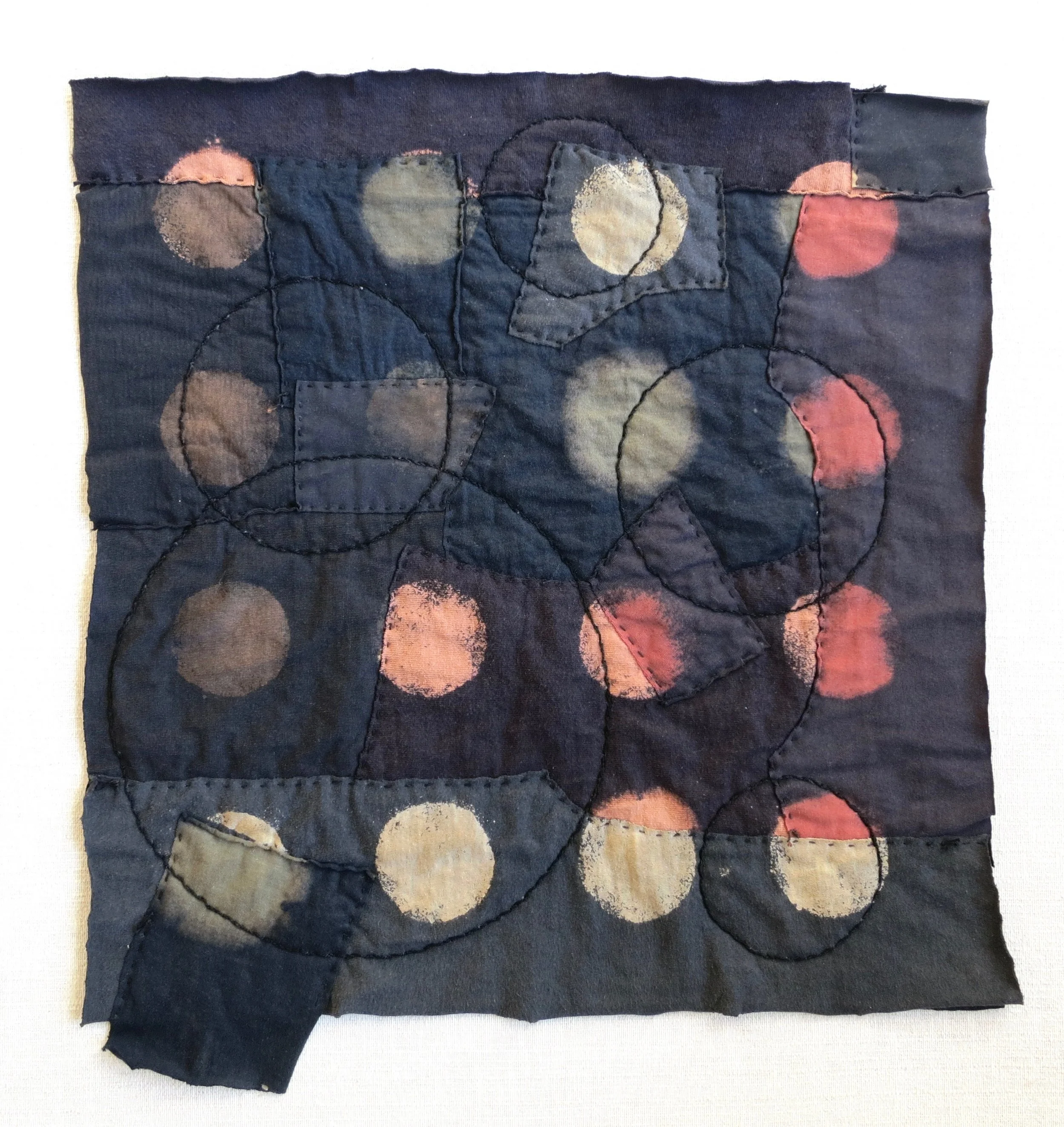 Black T Boro: Circles 20" x 20" Cotton t-shirts collaged, hand sewn and color manipulated.