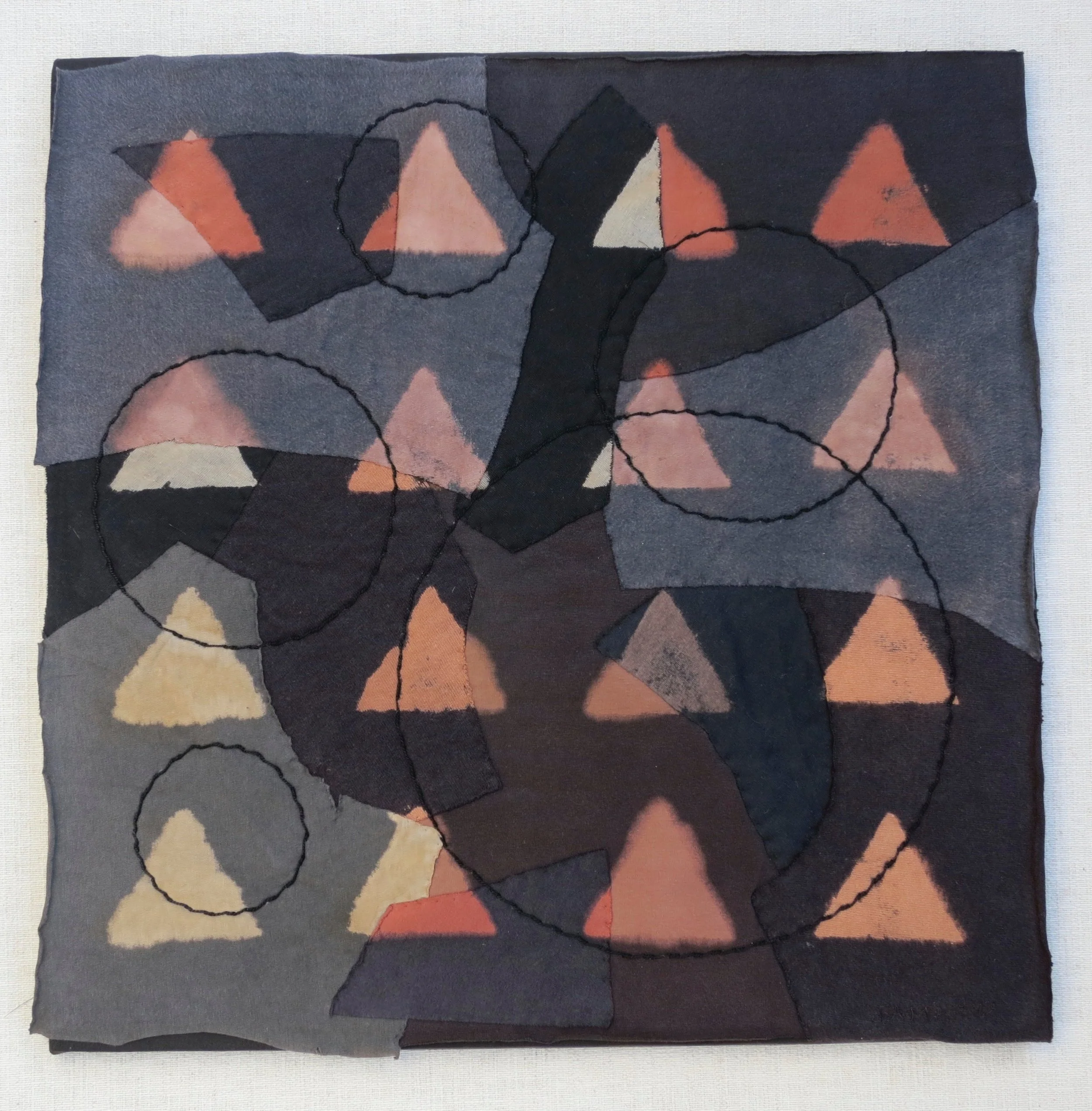 Black T Boro: Triangles 20" x 20" Cotton t-shirts collaged, hand sewn and color manipulated.