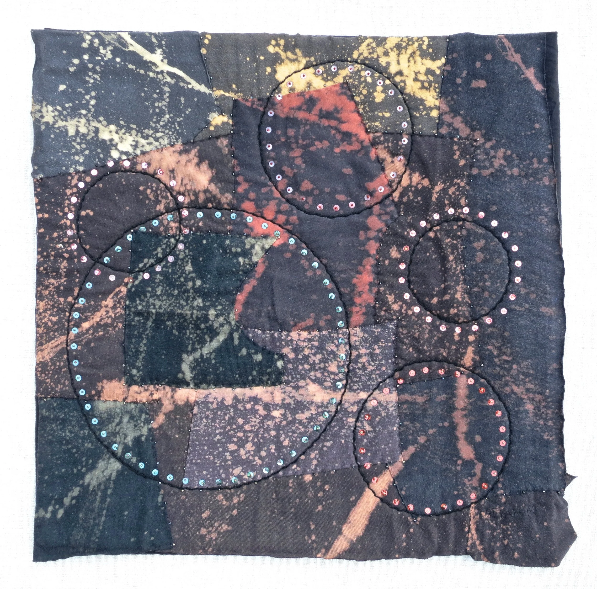 Black T Boro: Splat and Spin 2014 20.5" x 20.5" Repurposed cotton t-shirts appliqué, rayon thread embroidery with vintage sequins and glass beads. 
