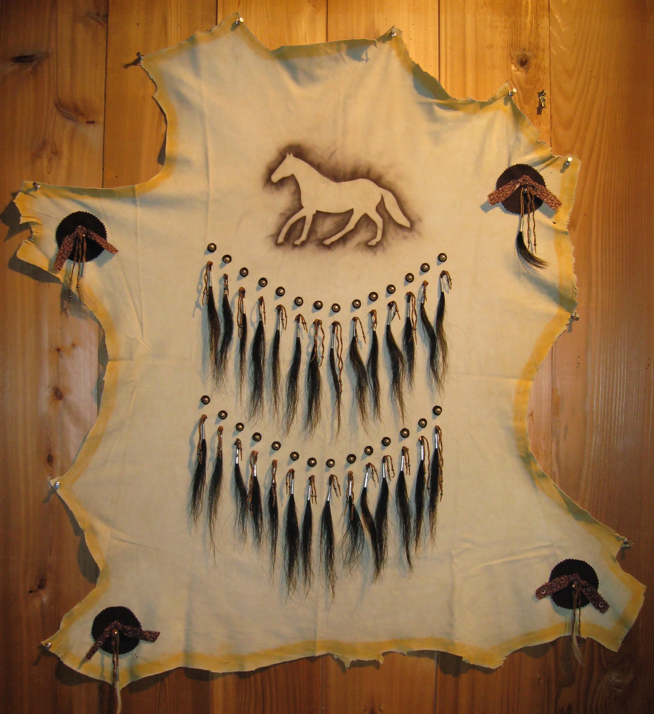 My Mane Man 2008 41" x 38" Leather hide, horsehair, tin, cotton scraps and powdered pigment. A tribute to Fifty/50.