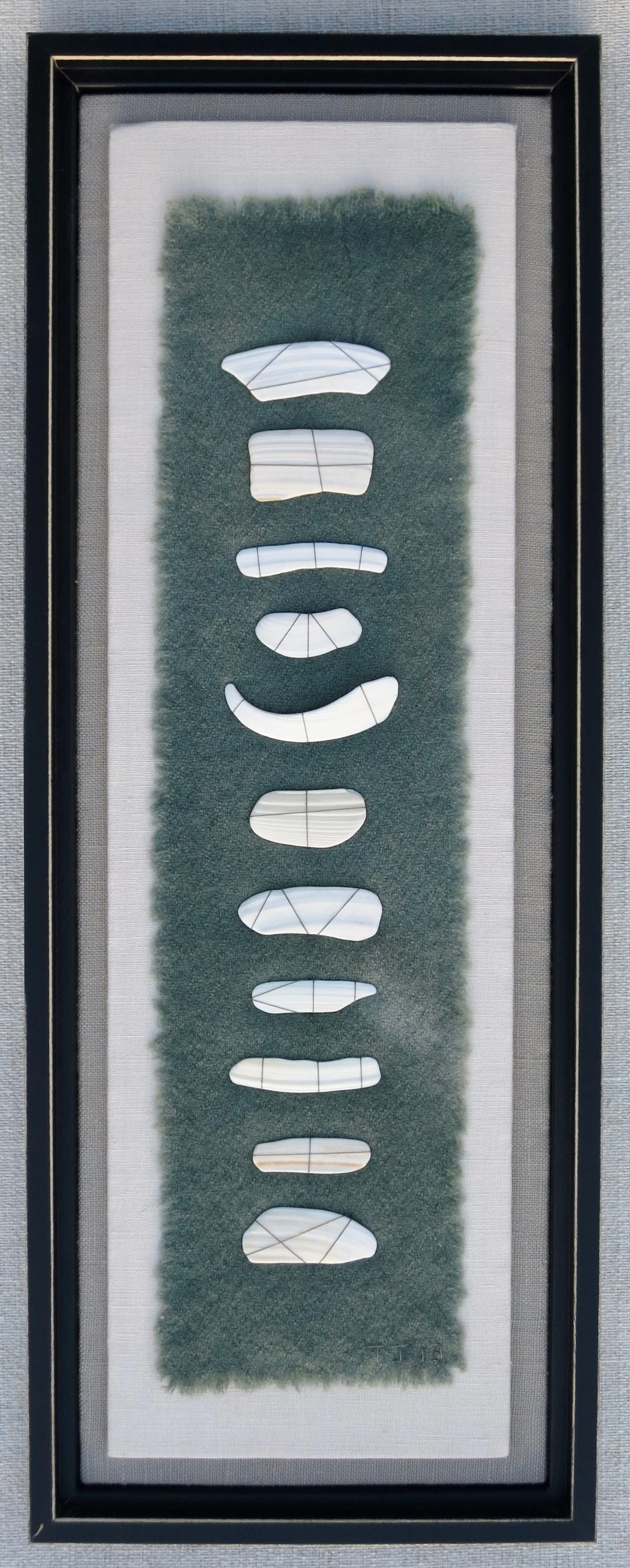 Shell Shards 2014 22.5" x 8.5" Shell shards, damaged wool hand sewn on linen.