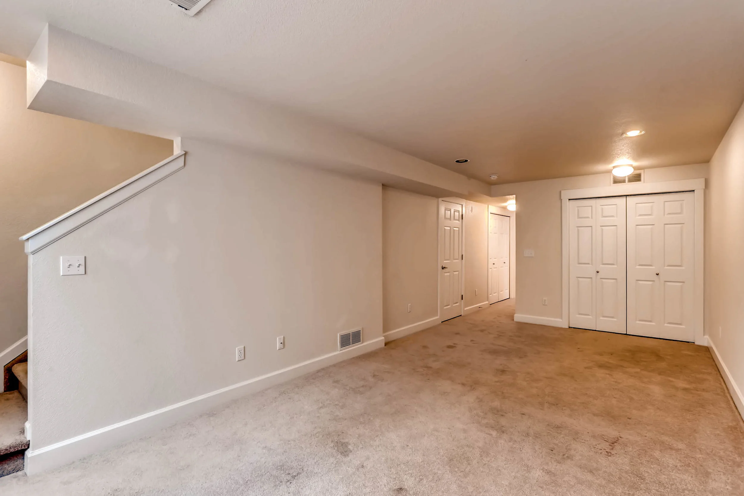 1275 Hummingbird Circle A-print-022-22-Lower Level Family Room-2700x1800-300dpi.jpg