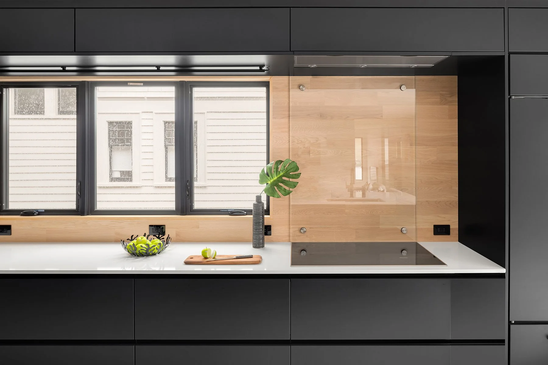 Contemporary Minimalist Kitchen Remodel by Blue Sound Construction, Inc. project photo