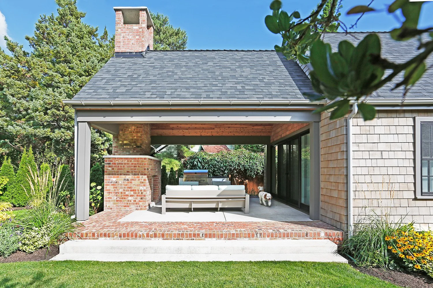 outdoor living room addition with new masonry fireplace