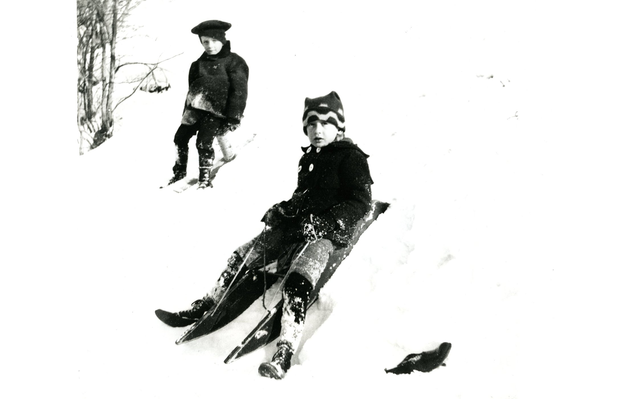 Boys on a jack jump and sled