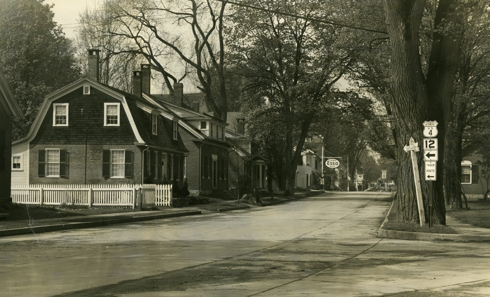 We'll begin our virtual stroll of Central Street at the east end of Tribou Park. Established in 1882, Tribou Park is bounded by Central Street to the south and Pleasant Street to the north.