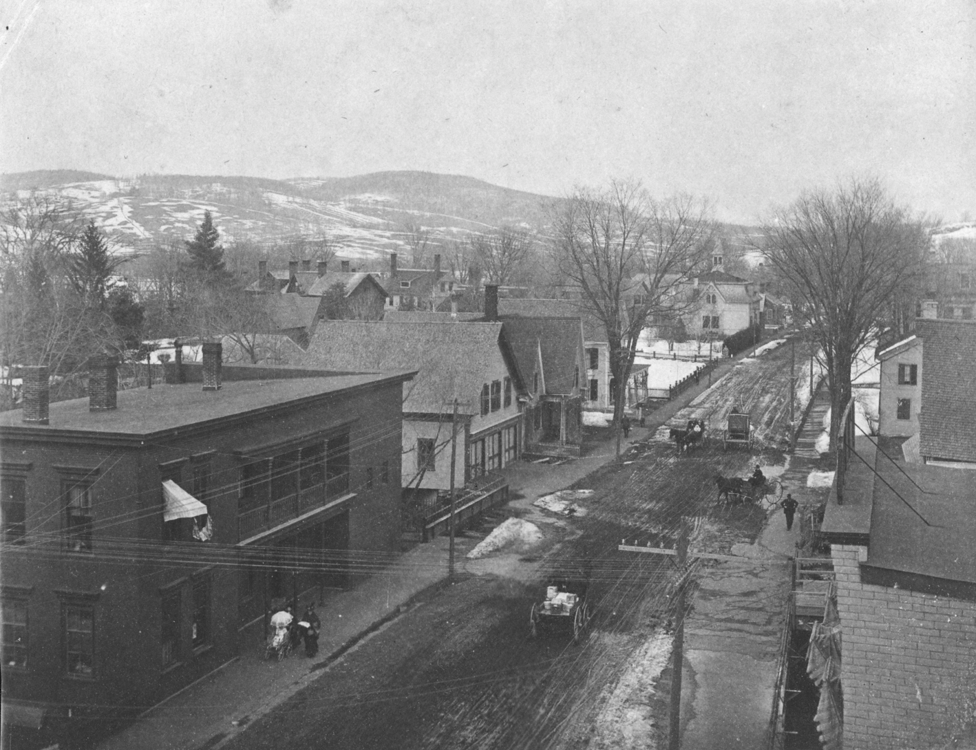 View of North Side of Central Street. The Engine House is shown just to the east of the jail, which is the large, rectangular-shaped building on the left side of the photo.