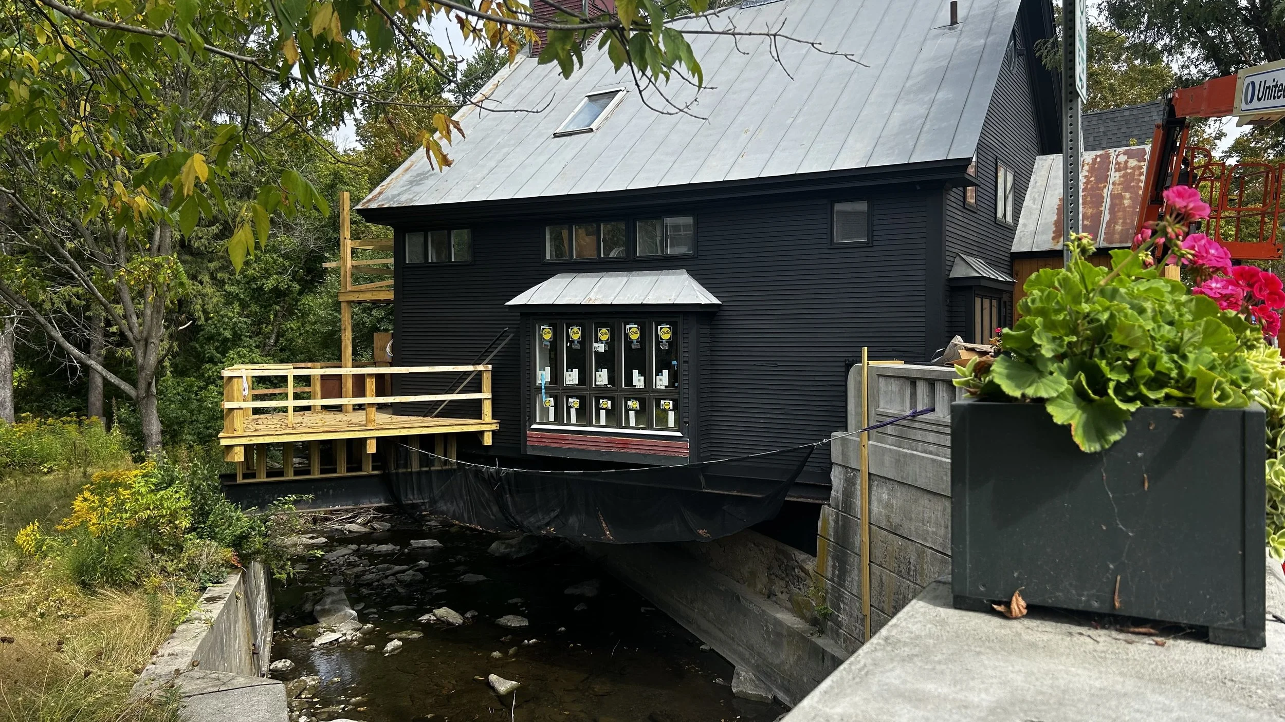 Section of old Fire House that hangs over the river. Photo taken by Noah Grabowski-Shaikh, September 9, 2025.