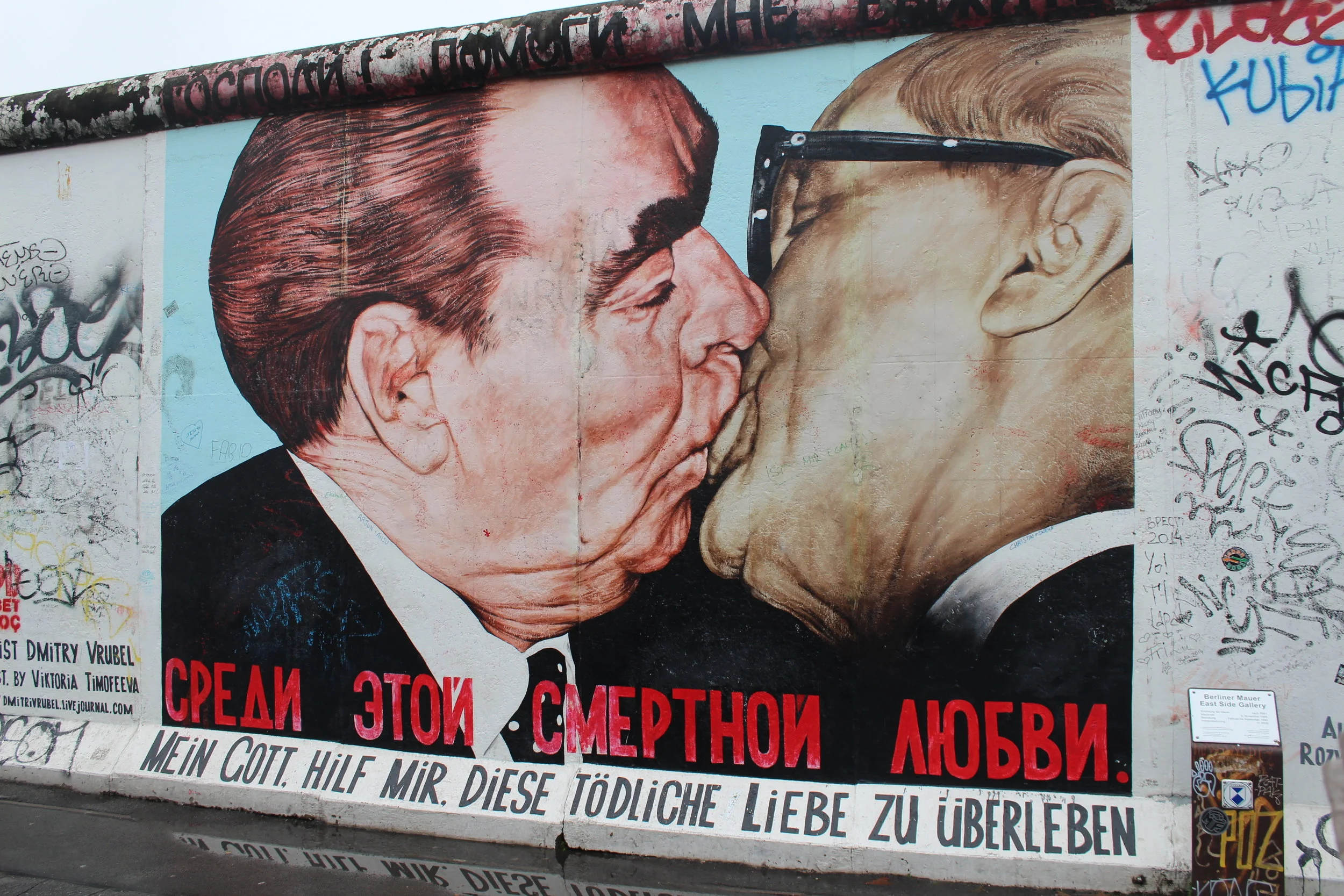 Here it is. The famous painting of two men kissing. The painting that people crowded around with their selfie sticks, ipads, phones and DSLRs. Yes, lots of people kissed in front of it - we saw three couples take kissing photos in the space of a minute. And yes, it is even more amazing in the "flesh"/on the wall. The painting, "Mein Gott hilf mir, diese tödliche Liebe zu überleben" (translated to "My God, help me to survive this deadly love" in English) was painted by Dmitri Wrubel. It depicts an iconic photograph of Leonid Brezhnev and Erich Honecker in a socialist fraternal kiss, taken by Régis Bossu in East Berlin on October 7, 1979. 