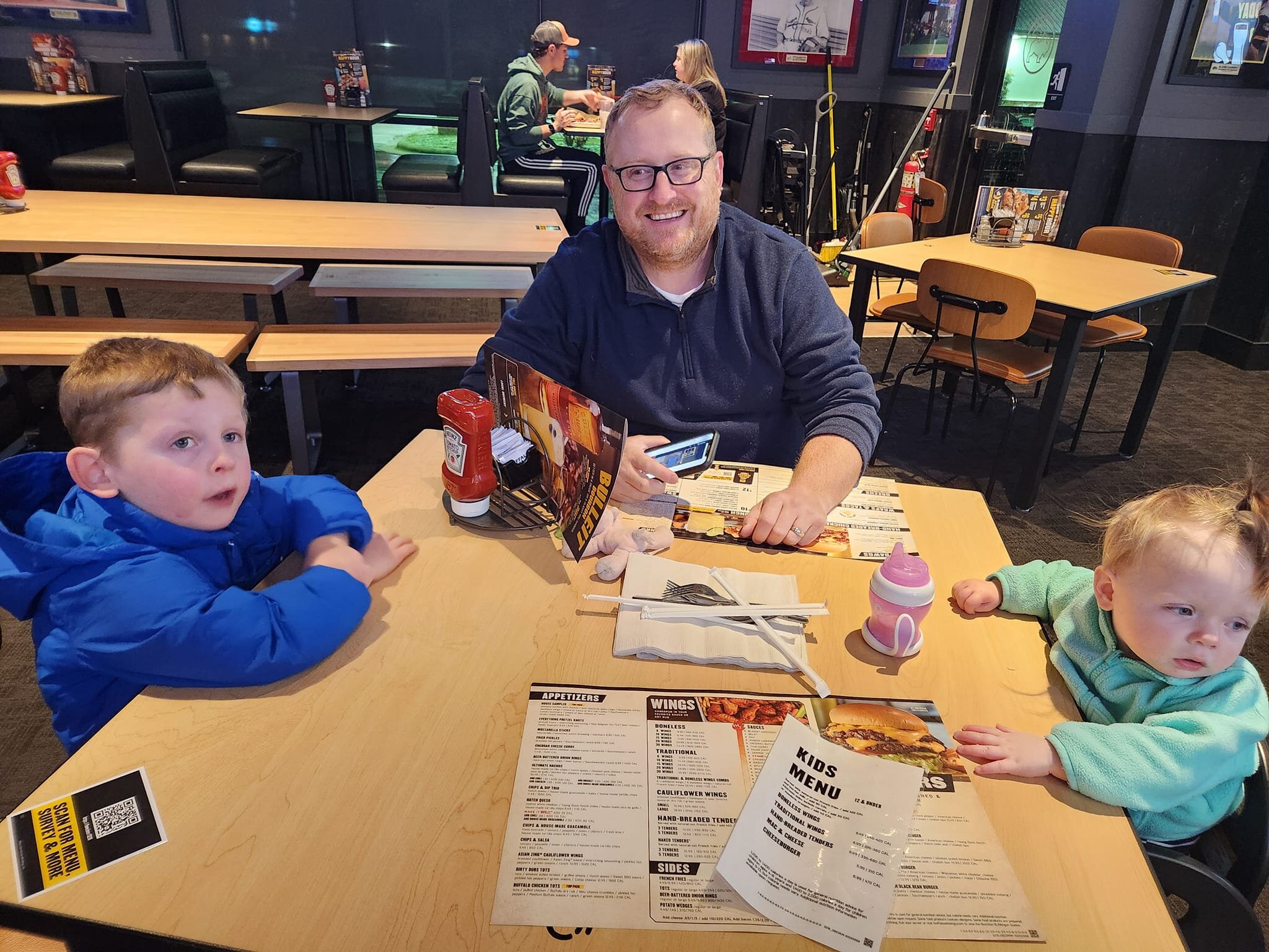 Annual Jan. 9 BWW post.

Kevin and I met on our first date 12 (!!!) years ago at Buffalo Wild Wings in Columbia.

I remember we ordered chips and salsa. Tonight, Eli insisted on chips and queso, and Evie gave our menus to the server.

Never would hav
