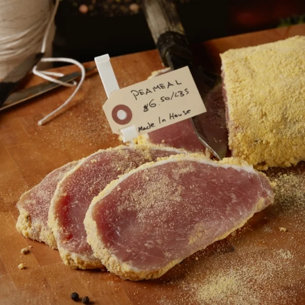 Peameal bacon - pork loin naturally cured without the use of nitrate, hand sliced to 3.5 ounces approximately