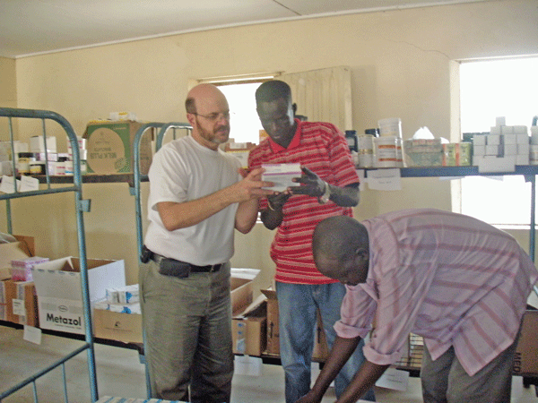 Kevin Kinsinger, Mayan Deng, and John Garang