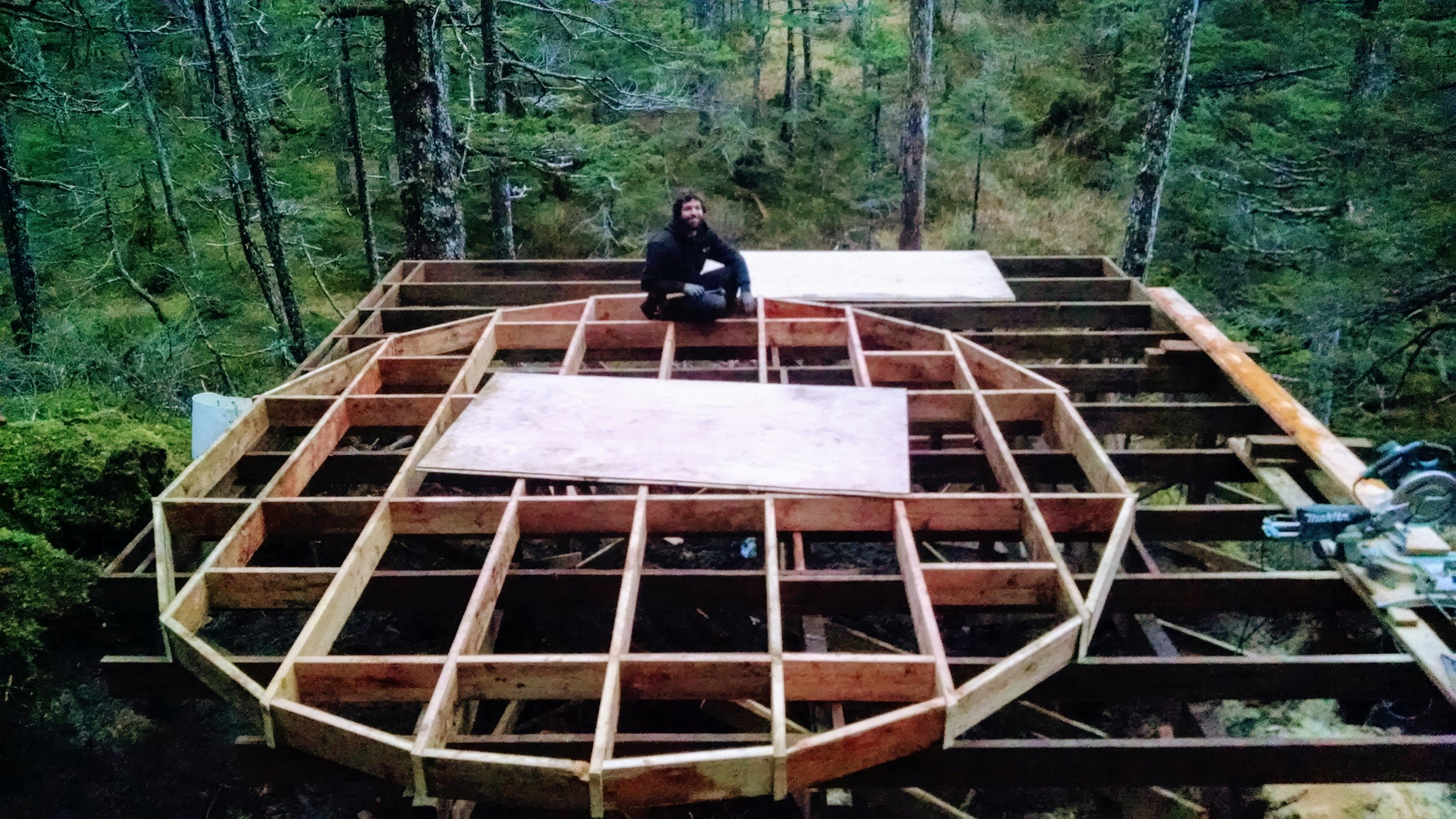  November 2, 2015: We are so close to getting the first yurt erected! At this point Izzy has returned home to Montana. Just Jason and Charity have been working together to finish the platform and get the yurt standing before taking a break for the wi