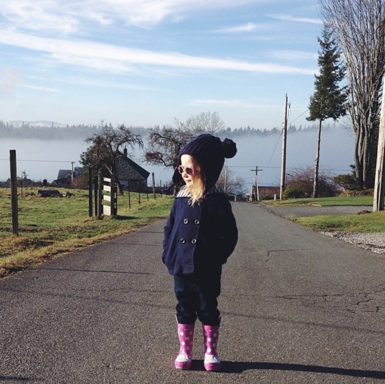 Our oldest daughter on a walk to see the cows in the Silver Beach neighborhood near Lake Whatcom.