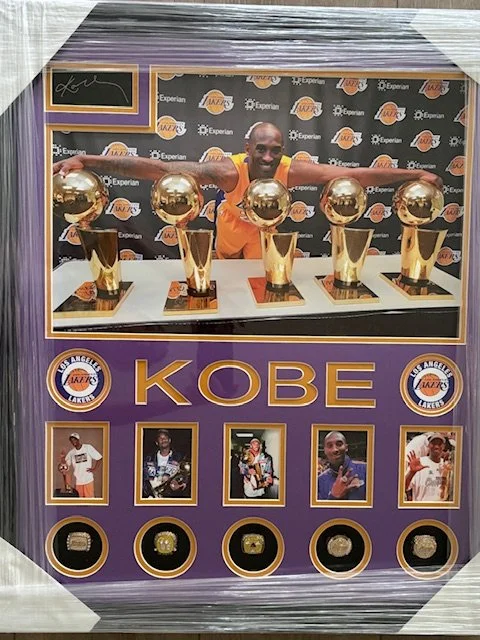 Kobe Bryant photo and championship rings