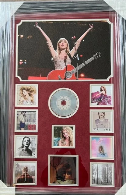 Taylor Swift signed photo display