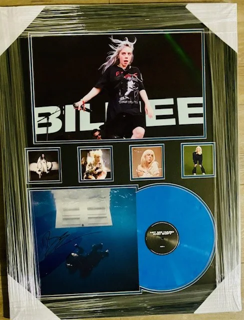 Billie Ellish signed photo album display