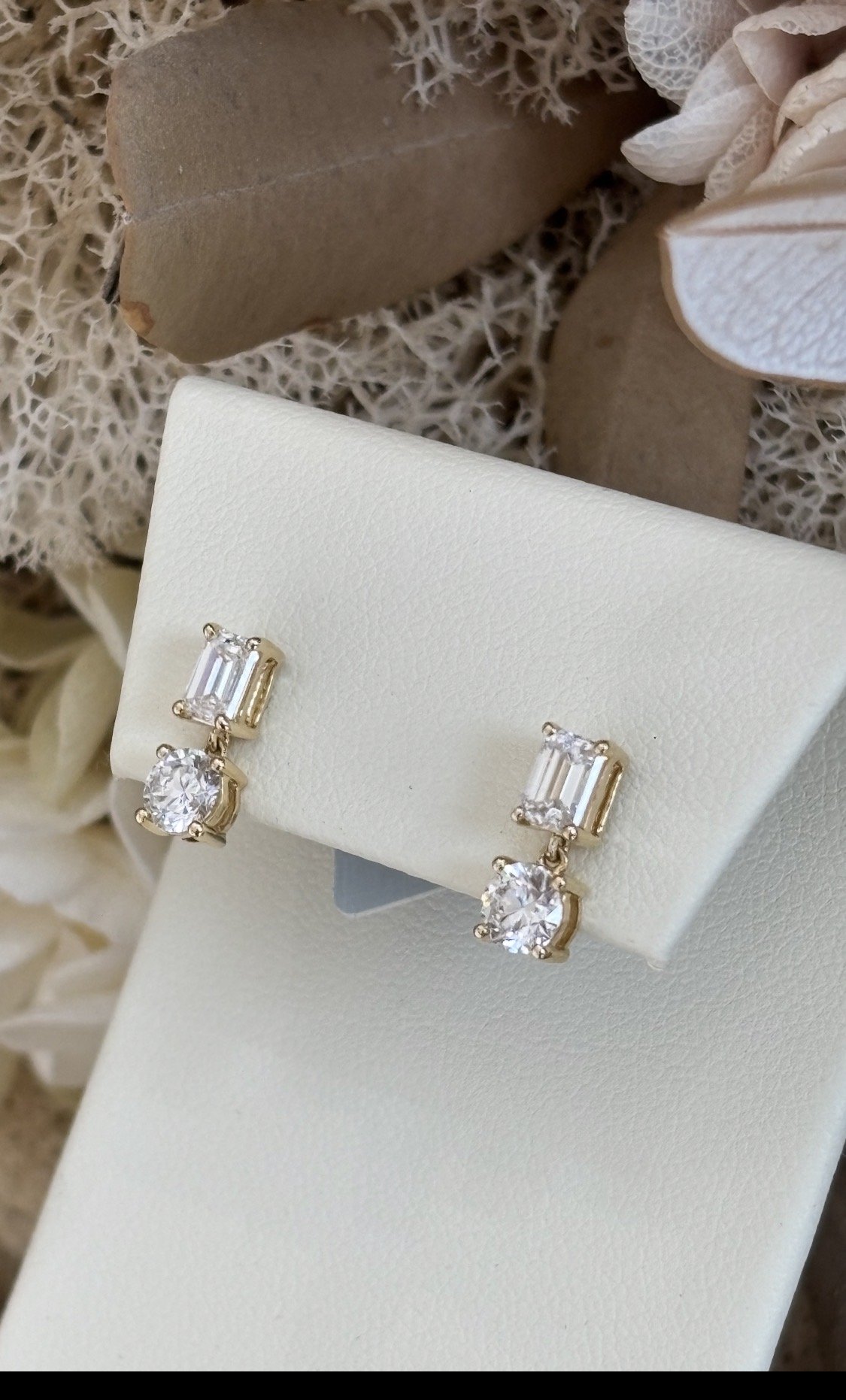 emerald and round diamond stud earrings bezel setting