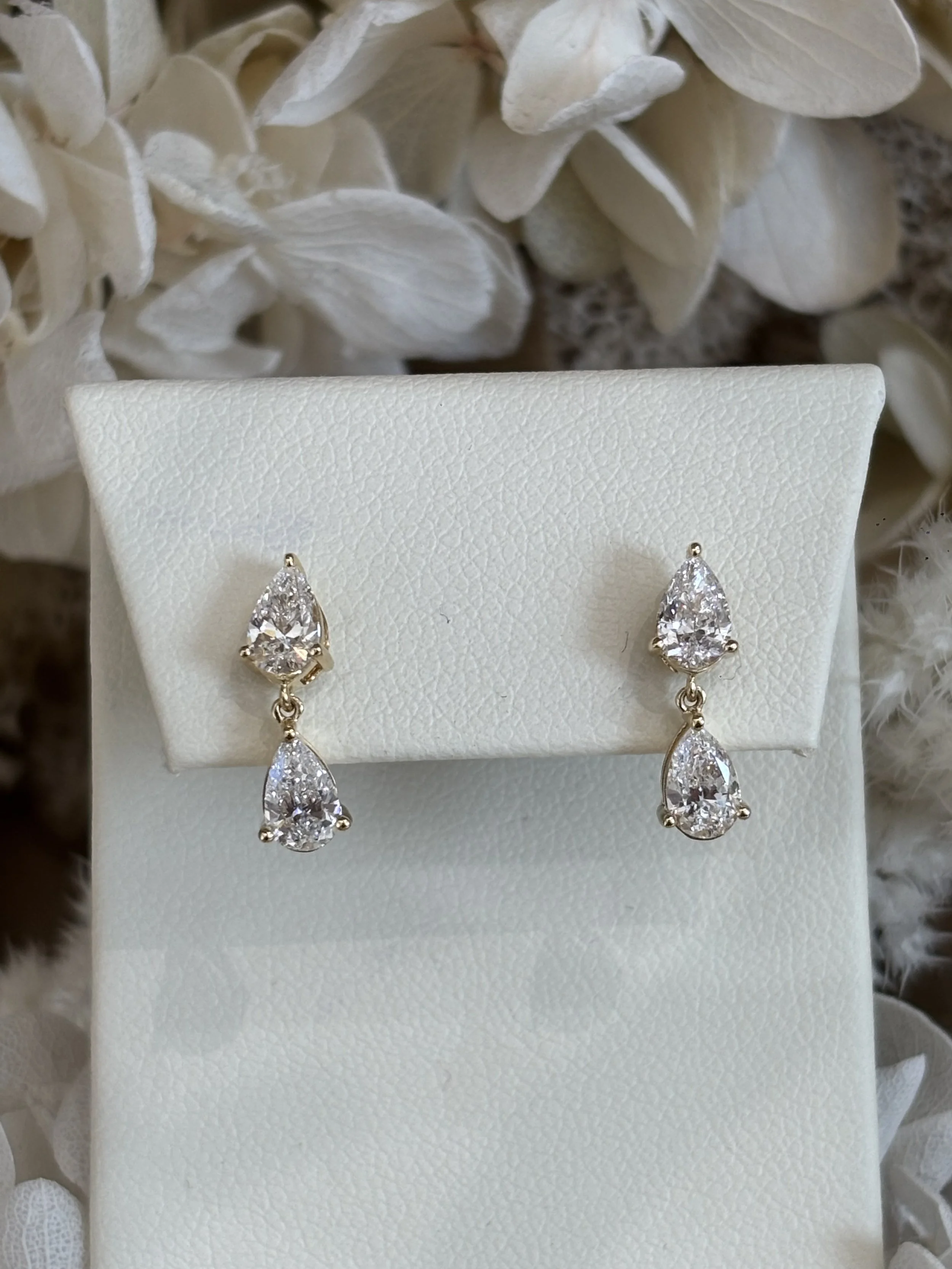 pear diamond stud earrings bezel setting