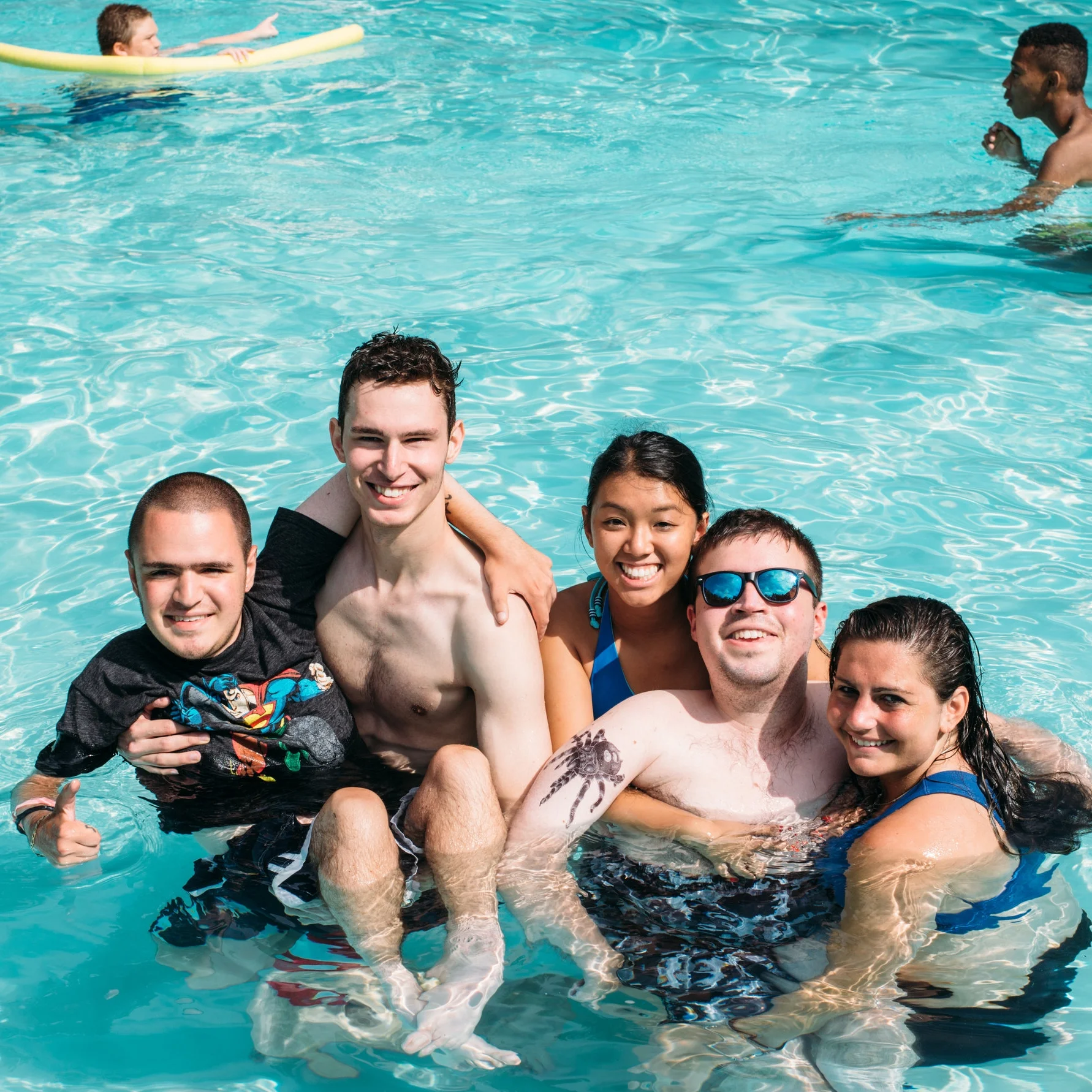 Swimming with friends in our outdoor pool. Camp Promise-East, 2016