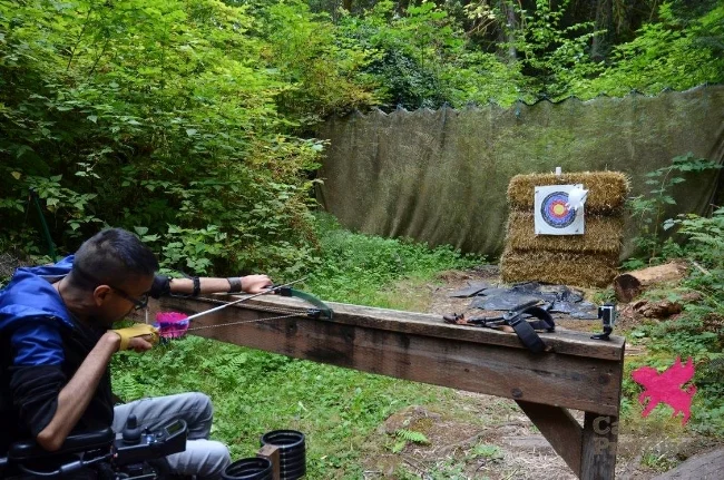 Amin at the archery range at Camp Promise-West.
