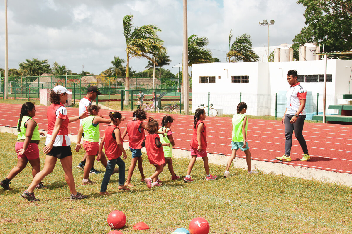 Coaches + group walking.jpg