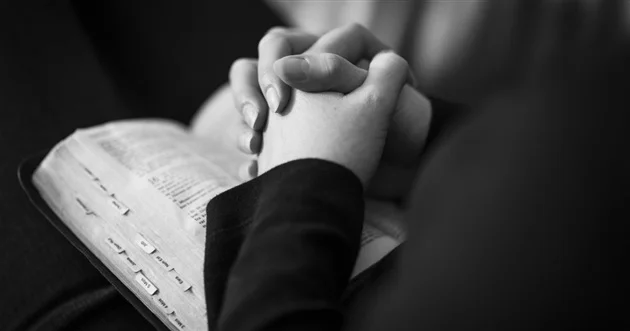25988-praying-hands-bible-woman-1200.630w.tn.jpg