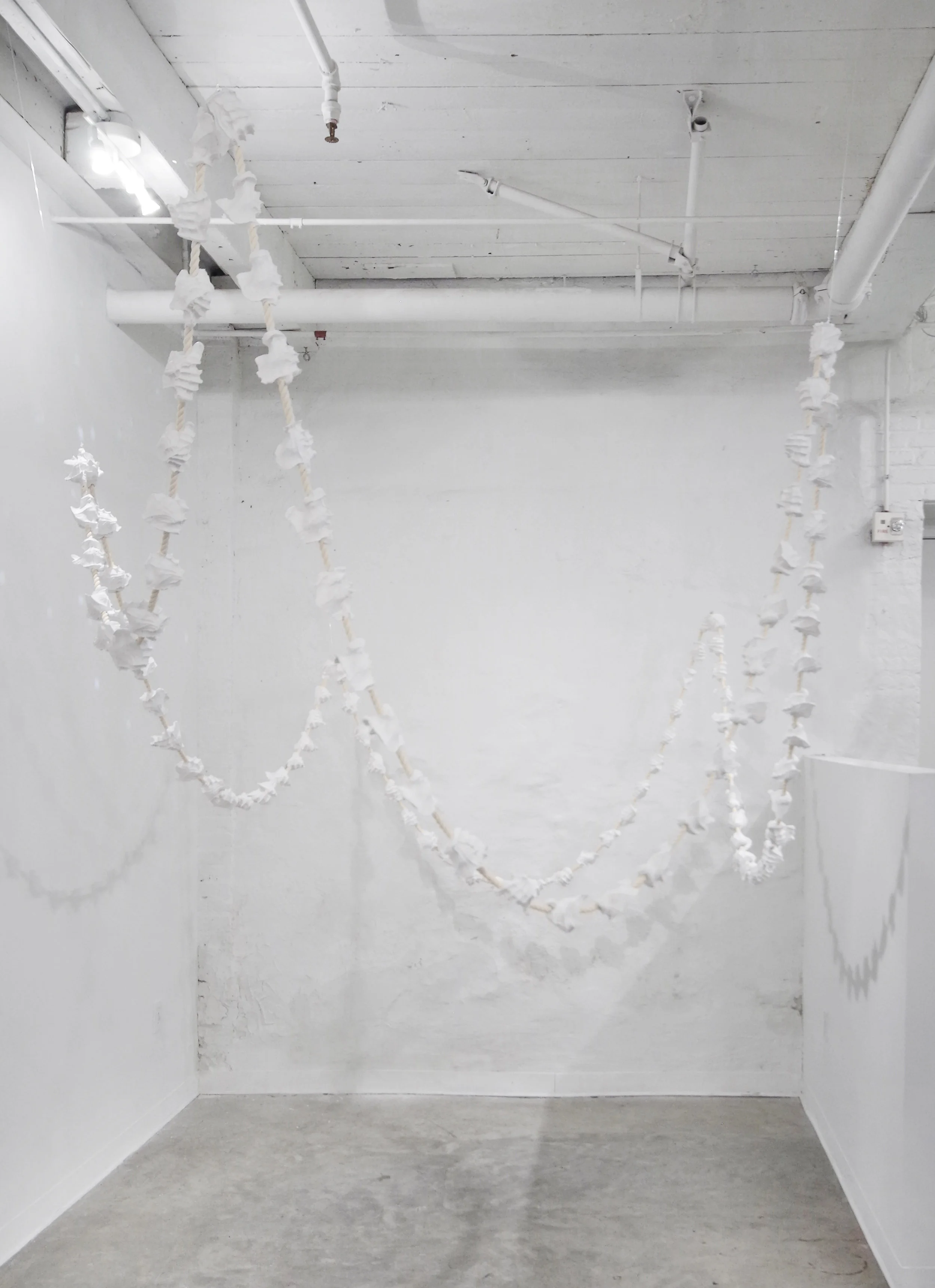 Holding_Space(Prayer_Necklace)_2016_Cotton_rope_plaster,_39 ft.jpg