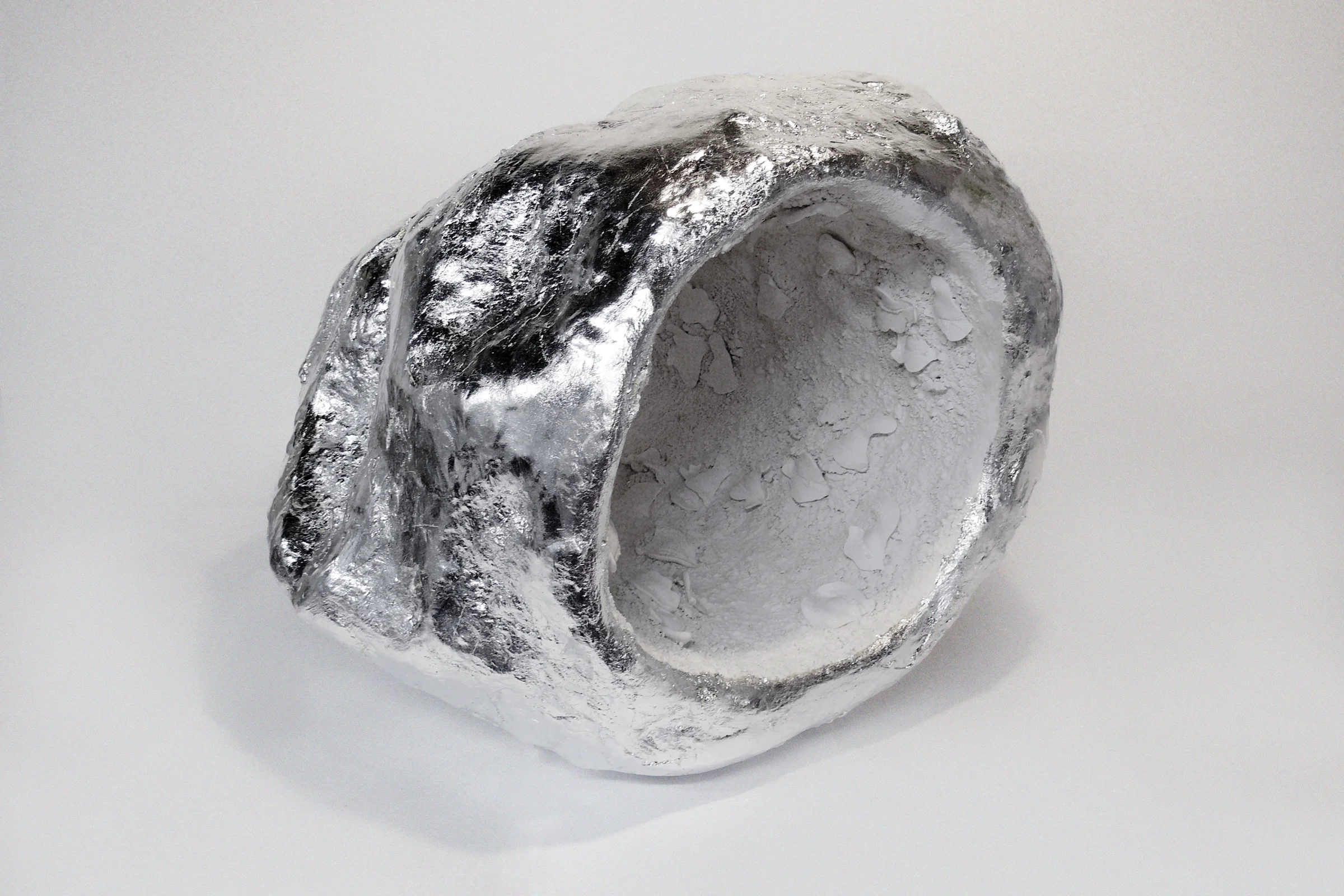 Sleep_(200,000_years)_2016_plaster_Hydrocal_aluminum_leaf_20.5x18x15.5%22.jpg