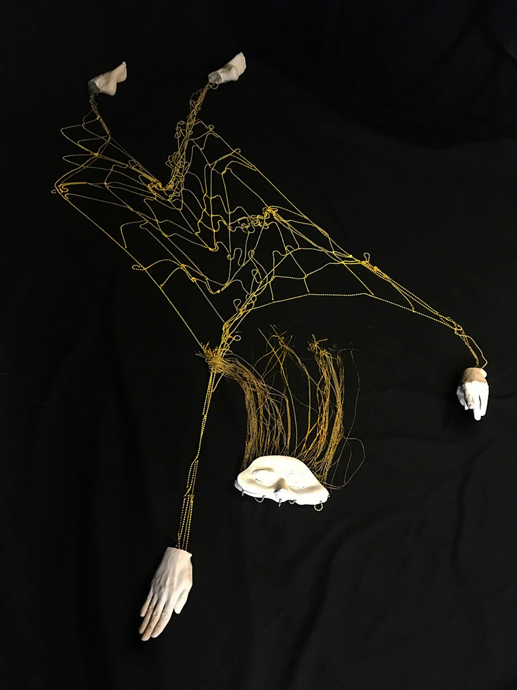 FLAYED BODY FLOAT, PLASTER, BRASS, THREAD, 68x48x52” (variable) 2020