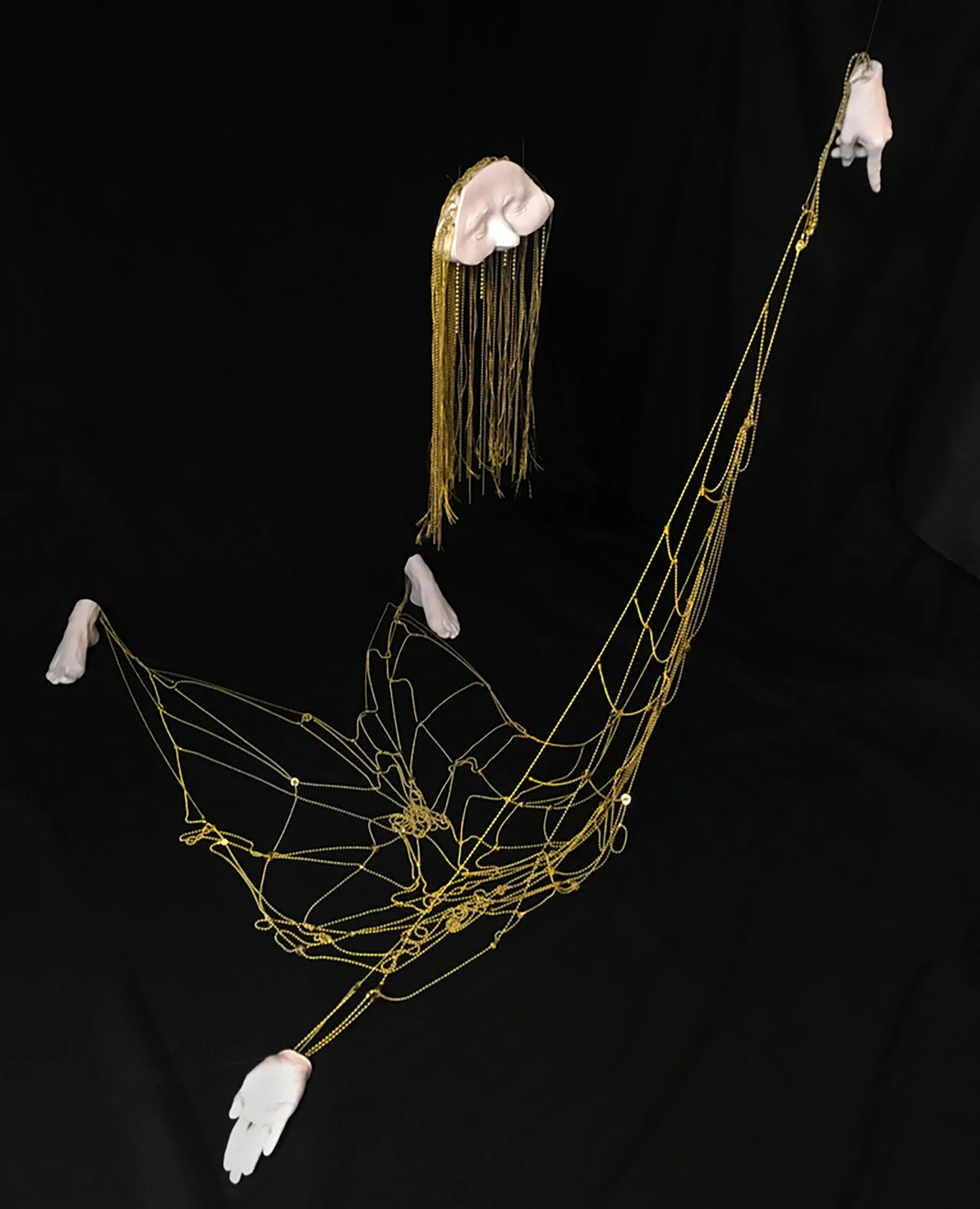 FLAYED BODY FLOAT, PLASTER, BRASS, THREAD, 68x48x52” (variable) 2020