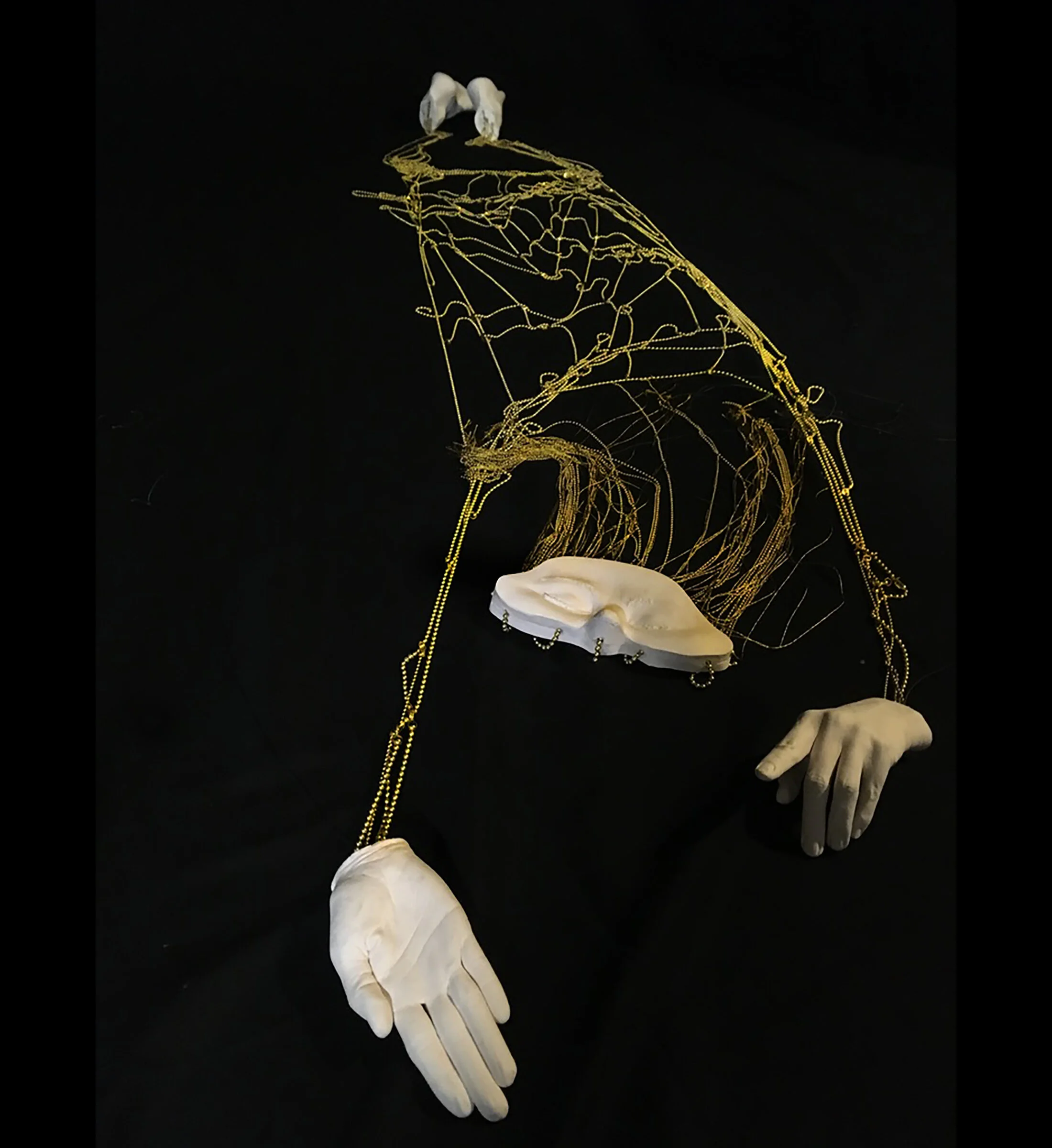 FLAYED BODY FLOAT, PLASTER, BRASS, THREAD, 68x48x52” (variable) 2020