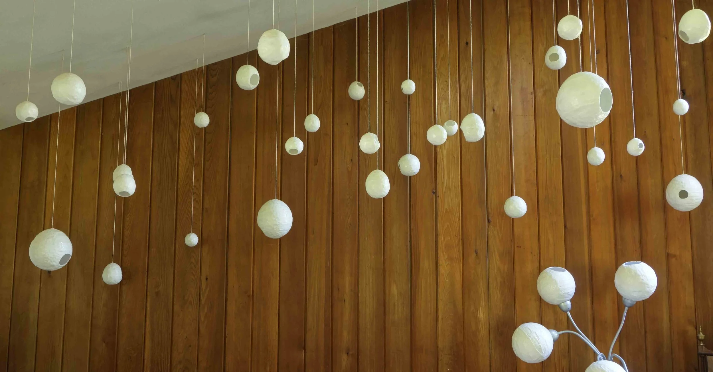 Ball series- Untitled, in private collection, 3" to 7" diameter, various opening sizes, 2009, plaster cloth & mod podge