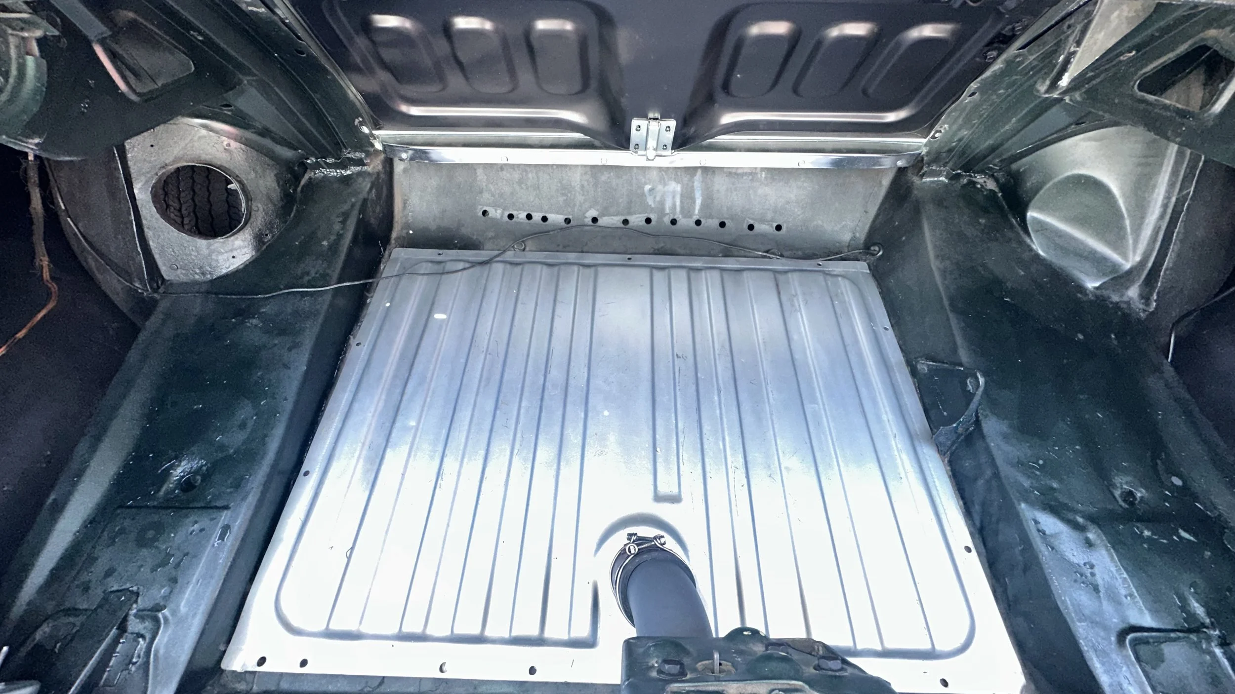 Production's Wheel-Well Hole to add Smoke in the Burnout Scene, and other Holes for Mounting Cameras