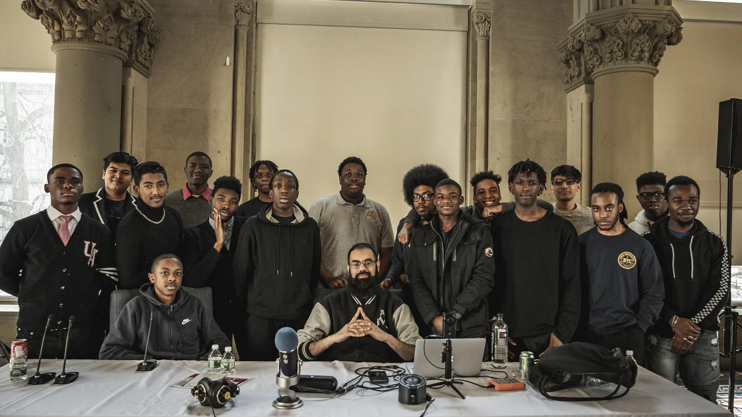 Young men from the NYC Urban Ambassadors program after participating in a Beatmaking workshop with Amjad Khan